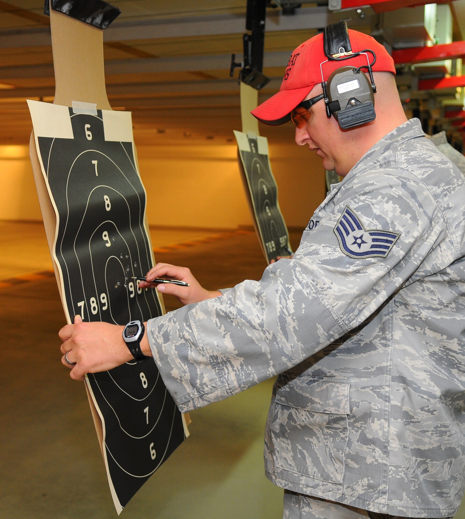 SPANGDAHLEM AIR BASE, Germany – Staff Sgt. James Lewis, 52nd Security Forces Squadron, scores a target during the firing range event of the 52nd SFS Decathlon here May 17. The 52nd SFS Decathlon consisted of five teams competing in 10 separate events. (U.S. Air Force photo/Airman 1st Class Dillon Davis)