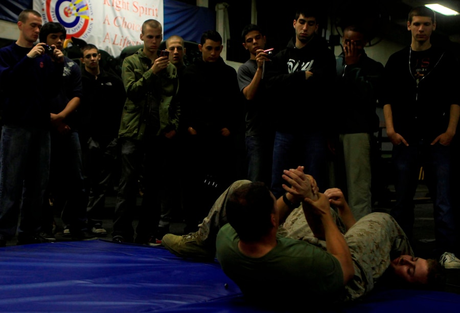Marines and Sailors with the 24th Marine Expeditionary Unit aboard the USS Iwo Jima (LHD-7) display equipment and demonstrate tactics t Marine Poolies recruited out of Long Island NY. and Boy Scouts from troop 287 out of Green Coslie PA. as they travel to participate in New York City's Fleet Week. Various units from II Marine Expeditionary Force and Marines Forces Reserve have organized under the 24th MEU to form the Special Purpose Marine Air Ground Task Force - New York. The Marines are embarking on the Navy’s Amphibious Assault Ships, the USS Iwo Jima (LHD -7) and USS New York (LPD-21) to take part in New York City's Fleet Week from May 25 to June 1, 2011. There, the Marines will showcase the capabilities of the MAGTF, and also honor those who have served by participating in a various of events during the Memorial Day weekend.