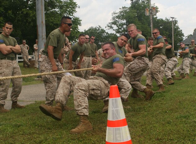 Marines from Initial Response Force B, React Company, Chemical Biological Incident Response Force fight against IRF A in a tug of war match during CBIRF’s battalion field meet 24 May. Headquarters and Support Company, IRF A and IFR B all competed against one another in several events to strengthen unit cohesion after the safety brief before the Memorial Day weekend.