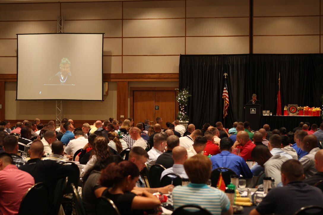 Retired Judge Pamela Iles speaks to a group of 850 Marines and sailors about the importance of knowing the service members under their command to effectively spot signs of trouble during the 2011 Leadership Awareness Conference at the Riverfront Convention Center in New Bern, N.C., May 25. Made up of noncommissioned officers and second and third class petty officers, the warriors in attendance were briefed for eight hours on the signs and corrective tools of suicide, alcohol and drug abuse, spousal violence and post-traumatic stress disorder.