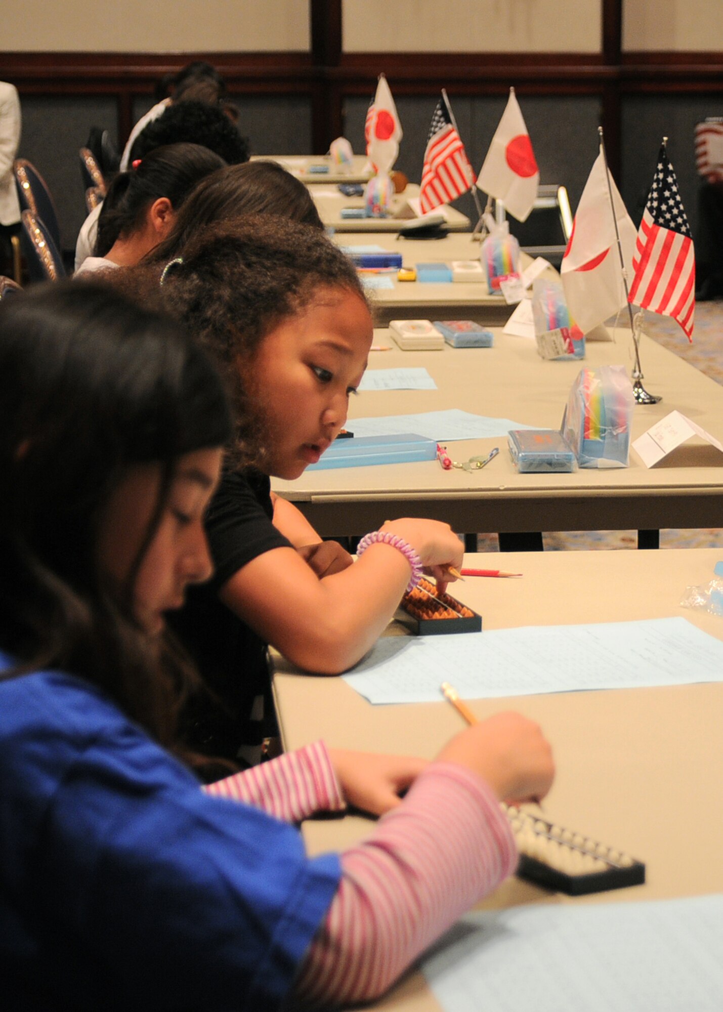 ROPPONGI, Japan -- Kanto Plains-area students compete during the 29th Kanto Area Department of Defense Dependent Students soroban contest held at the New Sanno hotel, May 25, 2011, Roppongi, Japan. This competition is just a small example of how DoDDS students interact with the host nation and can demonstrate appreciation for its culture and history. (U.S. Air Force photo/Senior Airman Andrea Salazar)