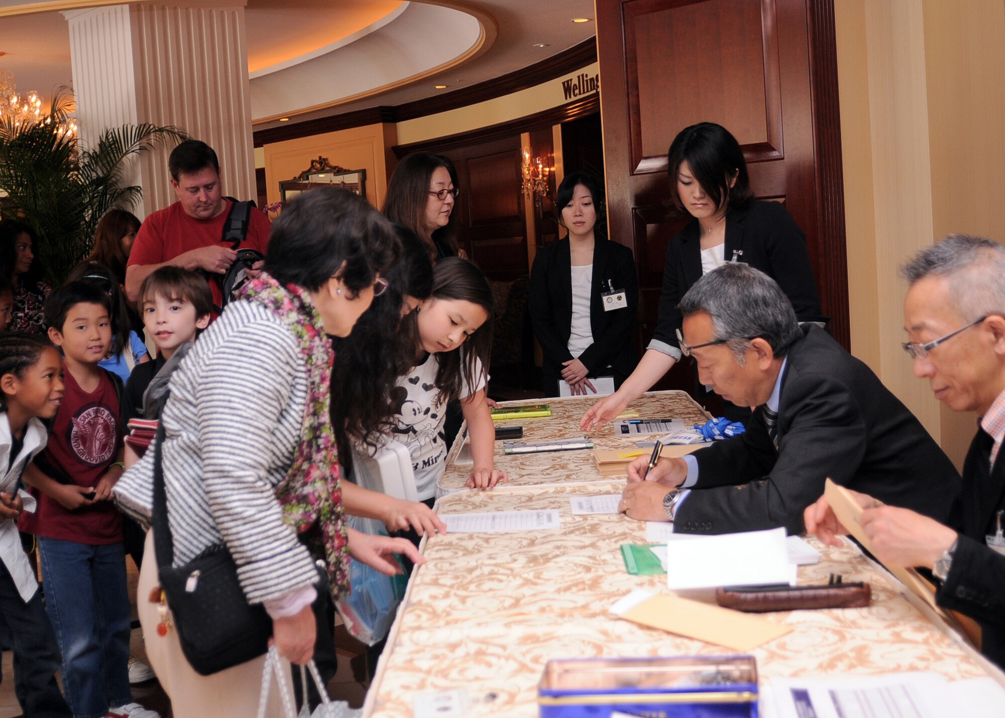 ROPPONGI, Japan -- Students register for the 29th Kanto Area Department of Defense Dependent Students soroban contest May 25, 2011 at the New Sanno hotel, Roppongi, Japan. DoDDS students, including those from Yokota elementary and middle schools, showcased their math skills with a Japanese version of an abacus, called the soroban. (U.S. Air Force photo/Senior Airman Andrea Salazar)