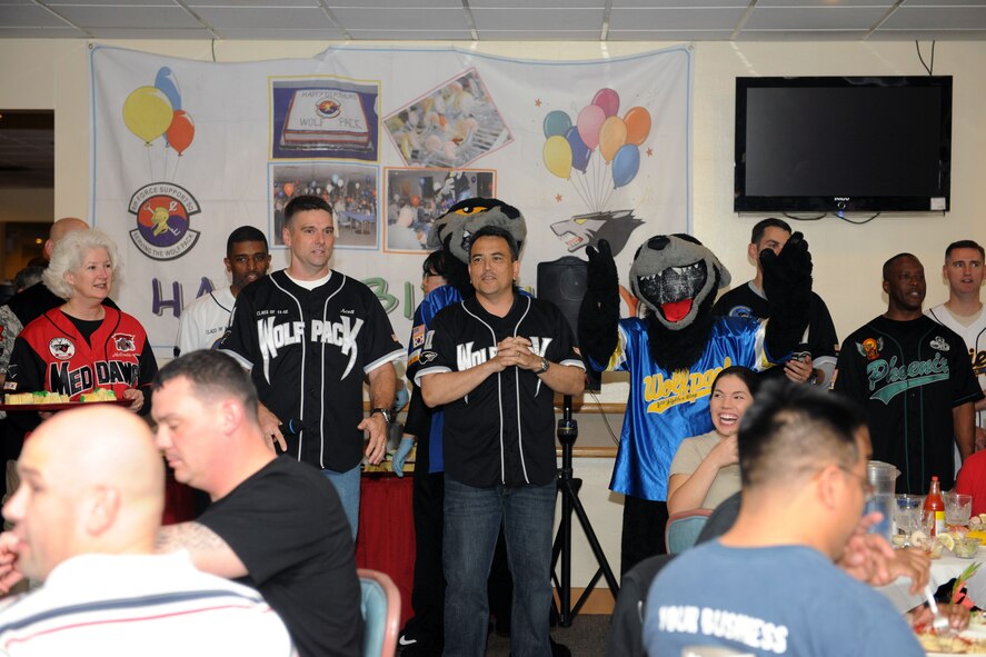 KUNSAN AIR BASE, Republic of Korea – Eighth Fighter Wing leadership sings happy birthday to Airmen during the birthday meal celebration at the dining facility here May 24. Leaders catered to Airmen during dinner by serving food, drinks and clearing plates for the attendees.   (U.S. Air Force photo/Senior Airman Brittany Y. Bateman)
