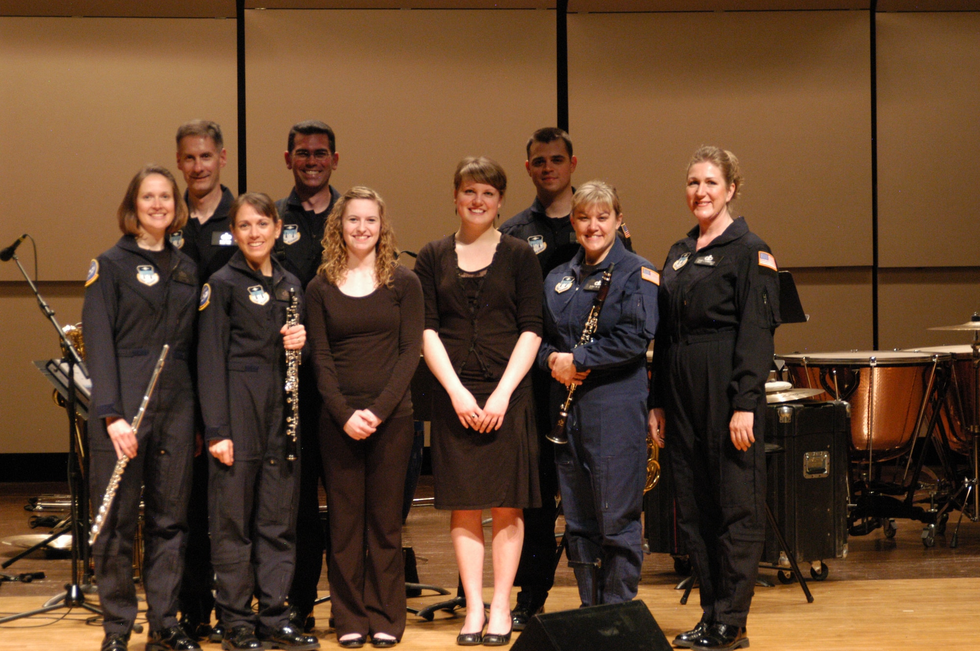 Academy Wiinds poses with student performers in Brainerd, Minnesota. These young musicians joined Academy Winds on stage for a performance of "Manhattan Beach March" by John Philip Sousa. Educational outreach is an important mission of the United States Air Force Academy Band, and Academy Winds shares decades of professional experience and knowledge to students around the country.
