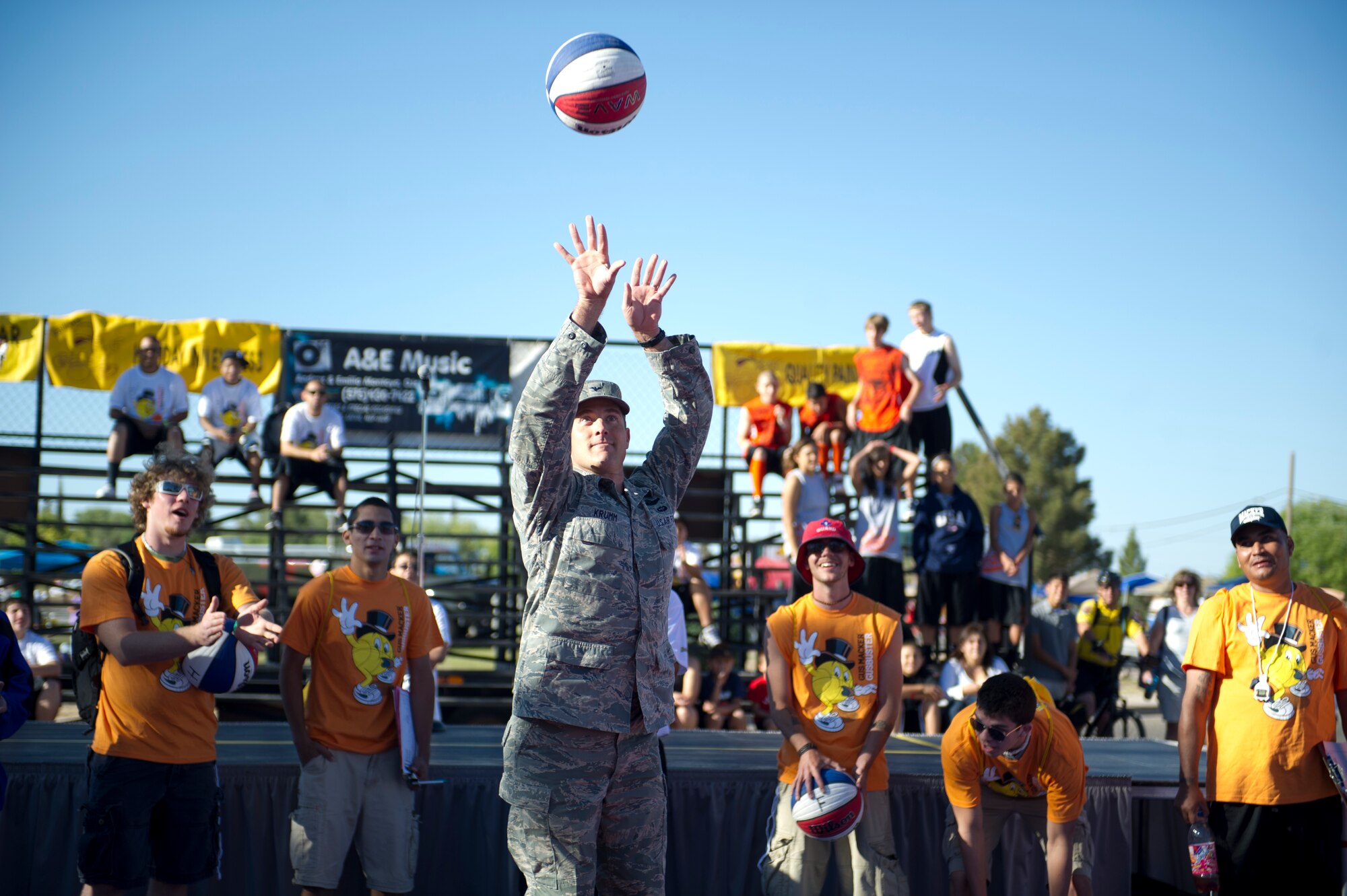ALAMOGORDO, N.M. -- Col. David Krumm, 49th Wing commander, shoots the opening free throw, May 21, 2011, to kick off the three-on-three basketball tournament and Armed Force Day at Washington Park. The event started with a T-38 flyover, and continued with displays from Holloman’s 49th Civil Engineer Squadron, 49th Logistics Readiness Squadron and the local N.M. Army National Guard, Bravo Company. (U.S. Air Force photo by Senior Airman Veronica Stamps/Released)