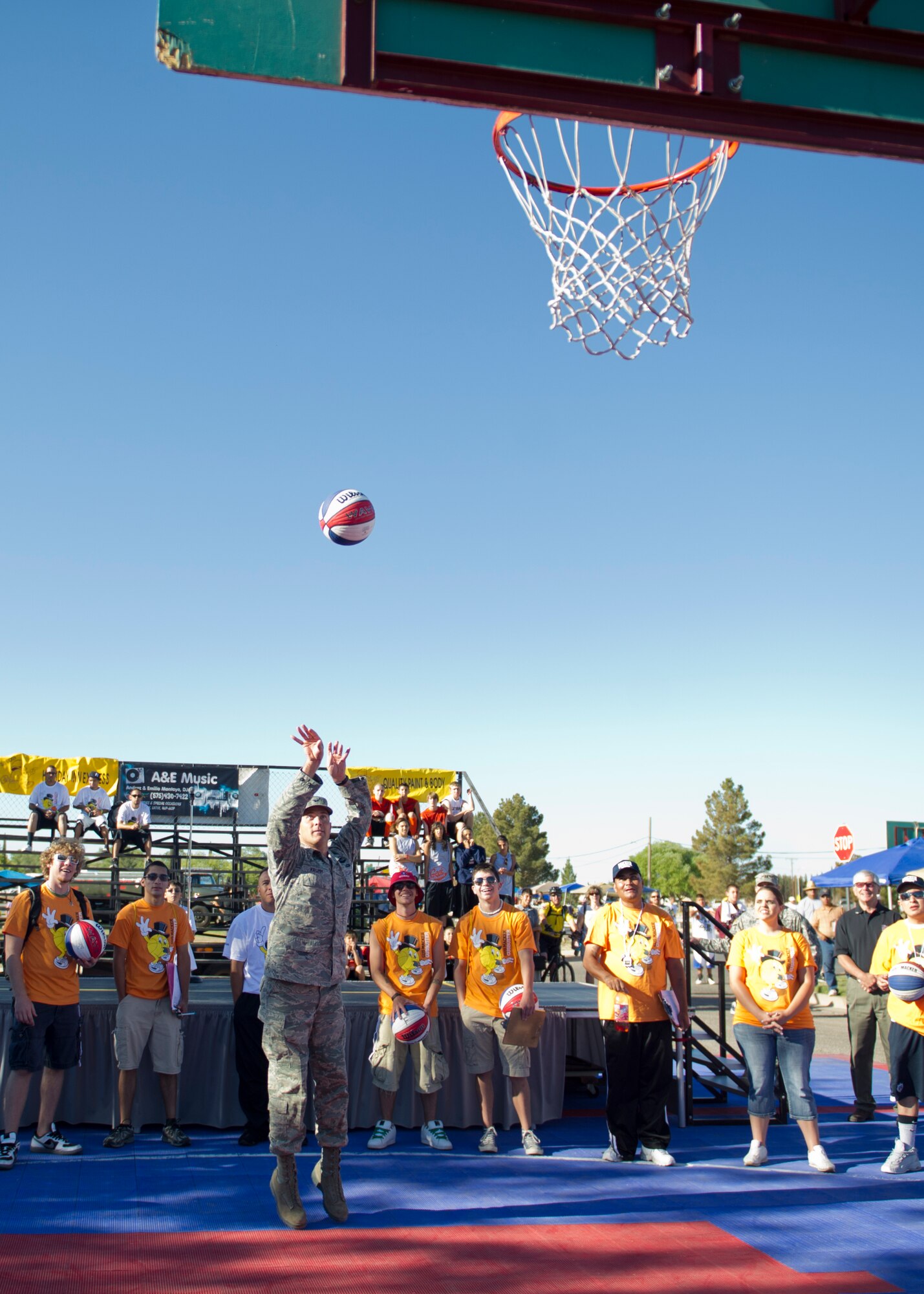 ALAMOGORDO, N.M. -- Col. David Krumm, 49th Wing commander, shoots the opening free throw, May 21, 2011, to kick off the three-on-three basketball tournament and Armed Forces Day at Washington Park. The event started with a T-38 flyover, and continued with displays from Holloman’s 49th Civil Engineer Squadron, 49th Logistics Readiness Squadron and the local N.M. Army National Guard, Bravo Company. (U.S. Air Force photo by Senior Airman Veronica Stamps/Released) 