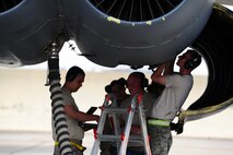 MINOT AIR FORCE BASE, N.D. -- Members of the 5th Aircraft Maintenance Squadron provide routine maintenance on a B-52H Stratofortress engine during the recent Operational Readiness Inspection here May 17. The ORI tested the 5th Bomb Wing’s conventional capabilities in a simulated combat setting. (U.S. Air Force photo/Senior Airman Michael J. Veloz) 