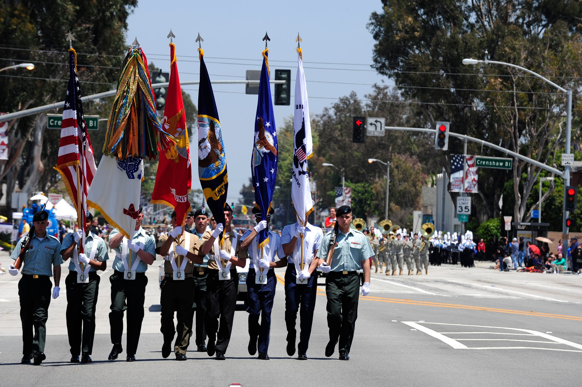 TORRANCE, Calif. -- Color guard members from all branches of service lead the parade during Armed Forces Day here Saturday, May 21, 2011. (U.S. Air Force photo/Staff Sgt. Andrew Satran) 

    
 