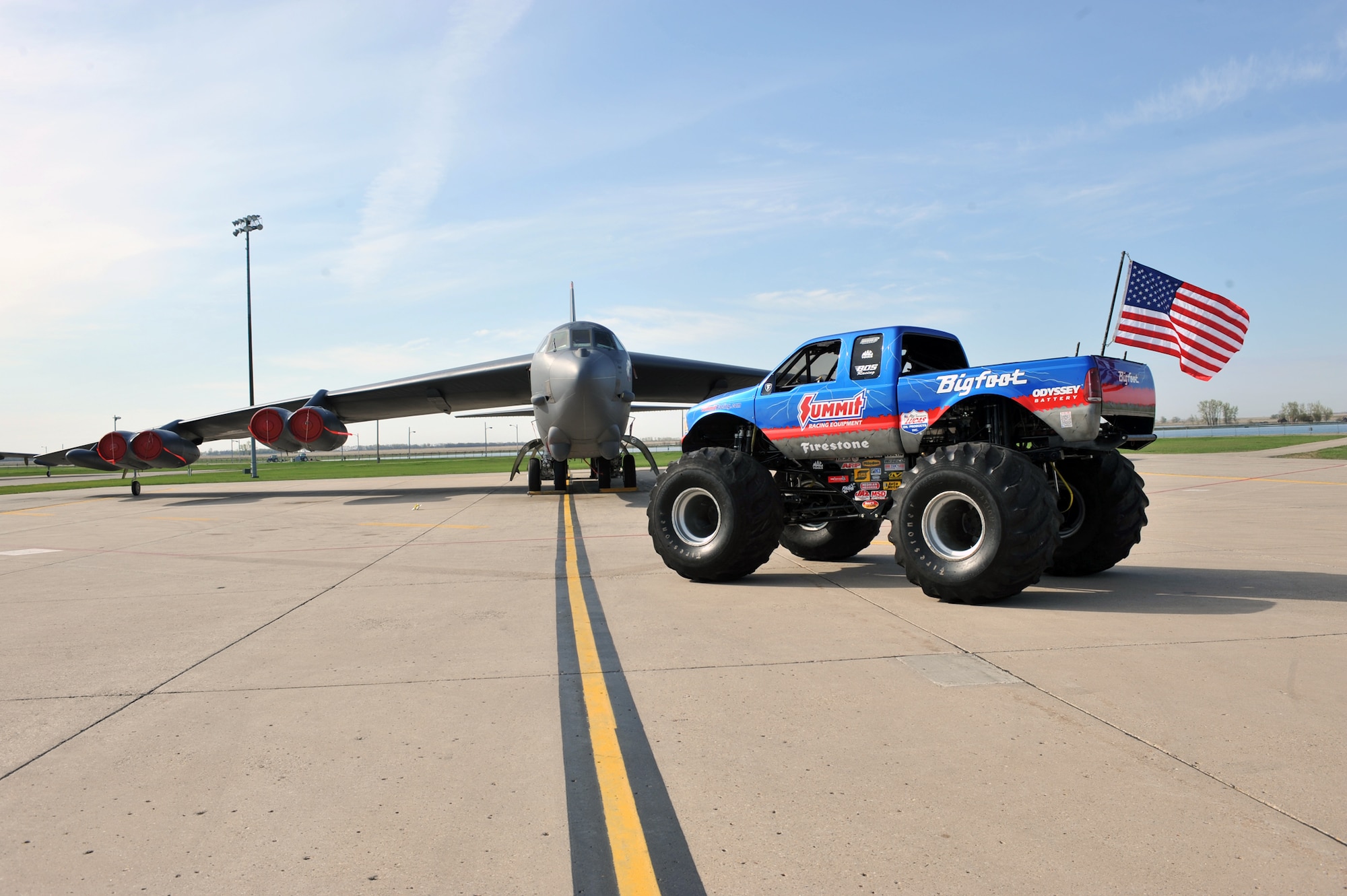 MINOT AIR FORCE BASE, N.D. -- The monster truck known as Bigfoot visited here as part of the grand opening celebration of the new Tires Plus location, May 20. Bigfoot was busy in action crushing cars and giving Team Minot Airmen a morale boost, as well as a rare glimpse into what it takes to operate these trucks. (U.S. Air Force photo/Staff Sgt. Keith Ballard)