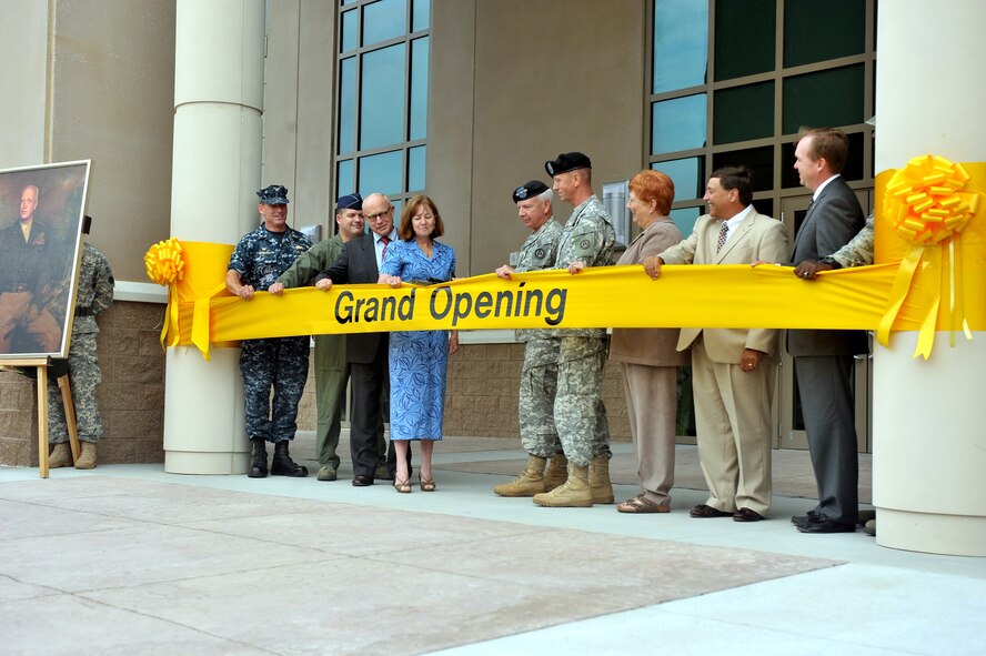 SHAW AIR FORCE BASE, S.C. - Lt. Gen. William G. Webster, Third Army commanding general, cuts the ribbon, marking the opening of Patton Hall, a command and control facility that will serve as the unit's new headquarters at Shaw Air Force Base, S.C., May 20. Third Army has been transferring to the Sumter, S.C. community after a 2005 Base Realignment and Closure mandate ordered the closure of Fort McPherson, Ga. (U.S Air Force Photo/ Airman 1st Class Ashley Gardner) (Released)
