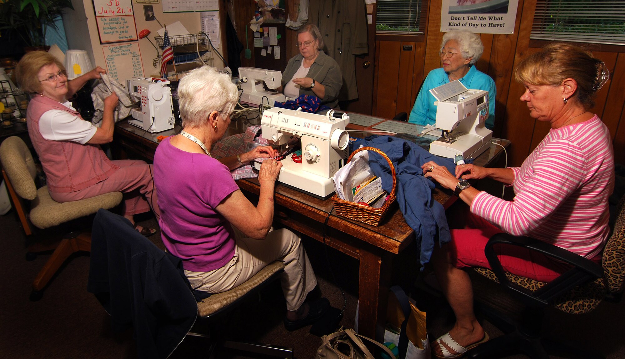 HotLanta Hot Pants group members sew pants to a variety of set specifications as called for according to the type of injury suffered by the military personnel.  The Dobbins Thrift shop provides space and money to help the ladies continue their mission, although, they will tell you they would be very happy to be put out of business.   (U.S. Air Force photo/ Brad Fallin)