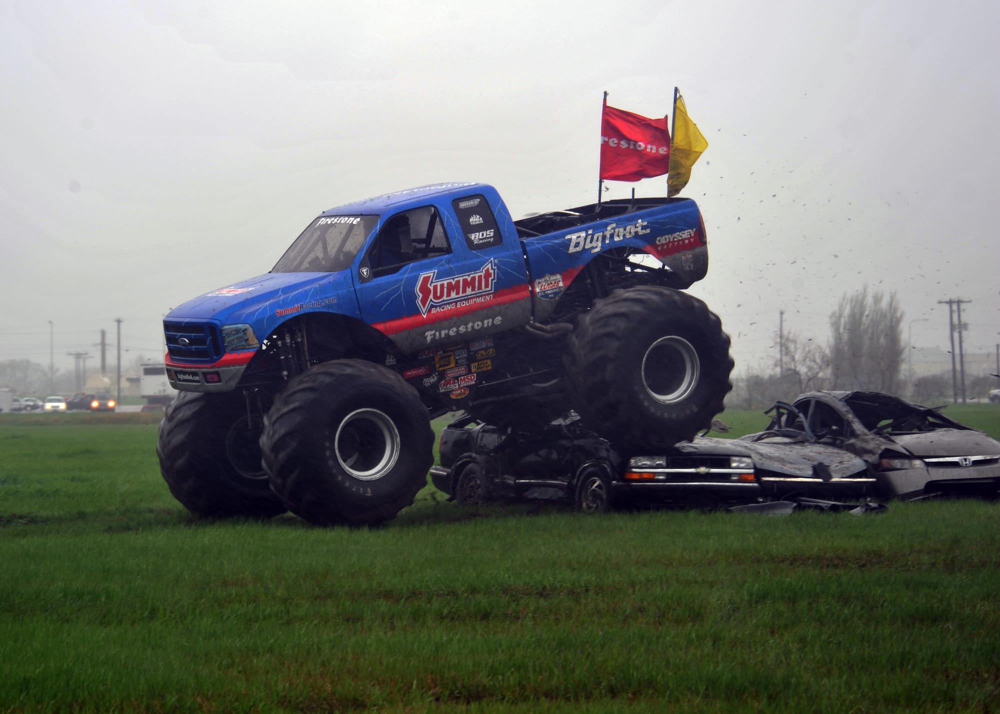 MINOT AIR FORCE BASE, N.D. -- The monster truck known as Bigfoot visited here as part of the grand opening celebration of the new Tires Plus location, May 20. Bigfoot was busy in action crushing cars and giving Team Minot Airmen a morale boost, as well as a rare glimpse into what it takes to operate these trucks. (U.S. Air Force photo/Staff Sgt. Keith Ballard)