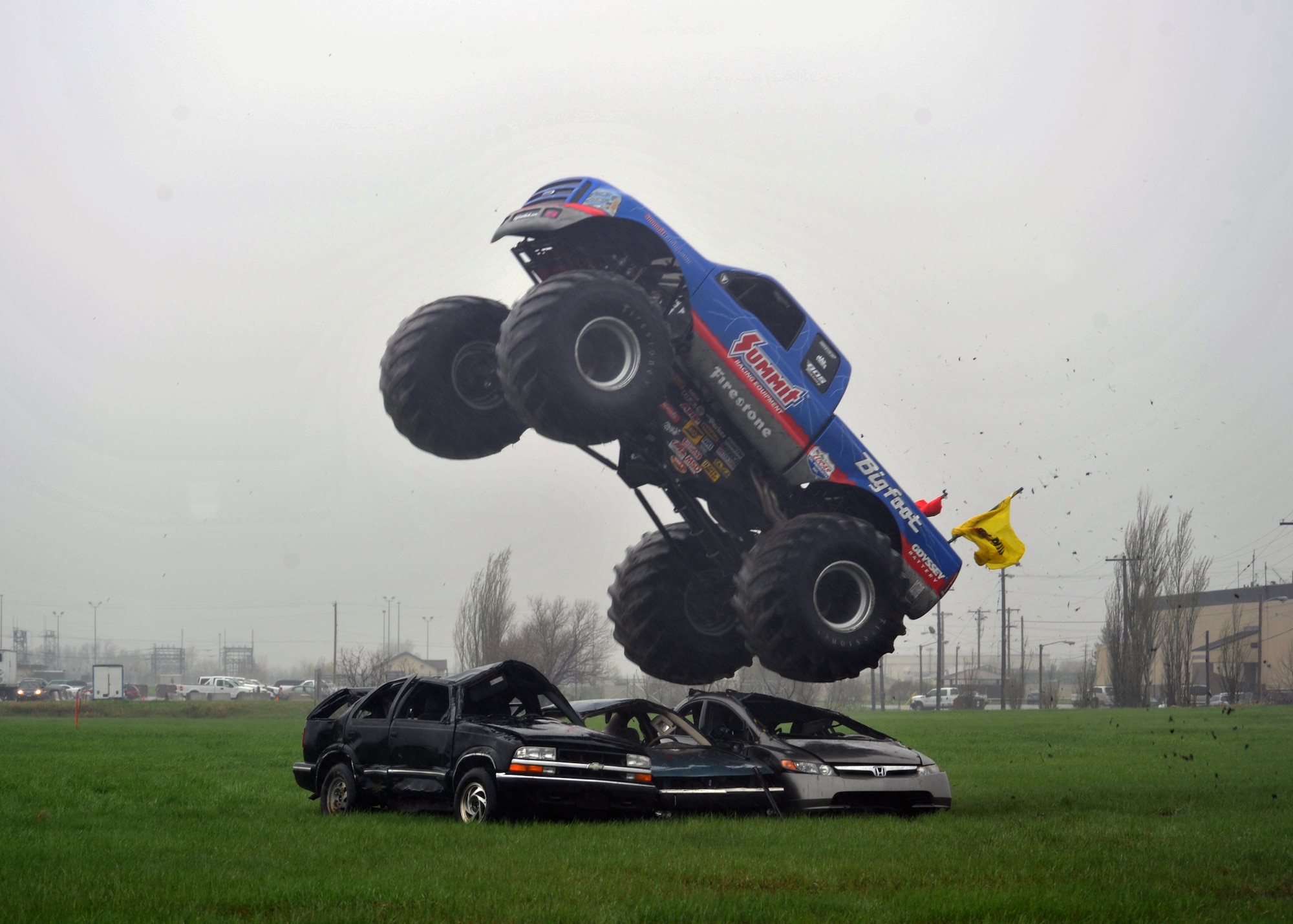 MINOT AIR FORCE BASE, N.D. -- The monster truck known as Bigfoot visited here as part of the grand opening celebration of the new Tires Plus location, May 20. Bigfoot was busy in action crushing cars and giving Team Minot Airmen a morale boost, as well as a rare glimpse into what it takes to operate these trucks. (U.S. Air Force photo/Staff Sgt. Keith Ballard)