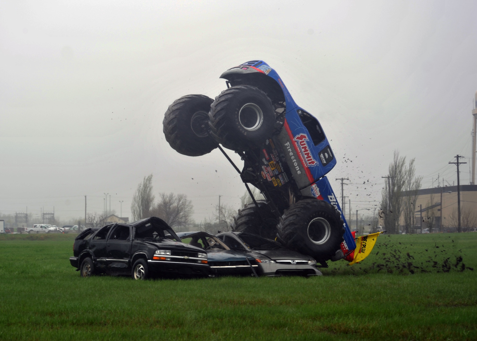 MINOT AIR FORCE BASE, N.D. -- The monster truck known as Bigfoot visited here as part of the grand opening celebration of the new Tires Plus location, May 20. Bigfoot was busy in action crushing cars and giving Team Minot Airmen a morale boost, as well as a rare glimpse into what it takes to operate these trucks. (U.S. Air Force photo/Staff Sgt. Keith Ballard)