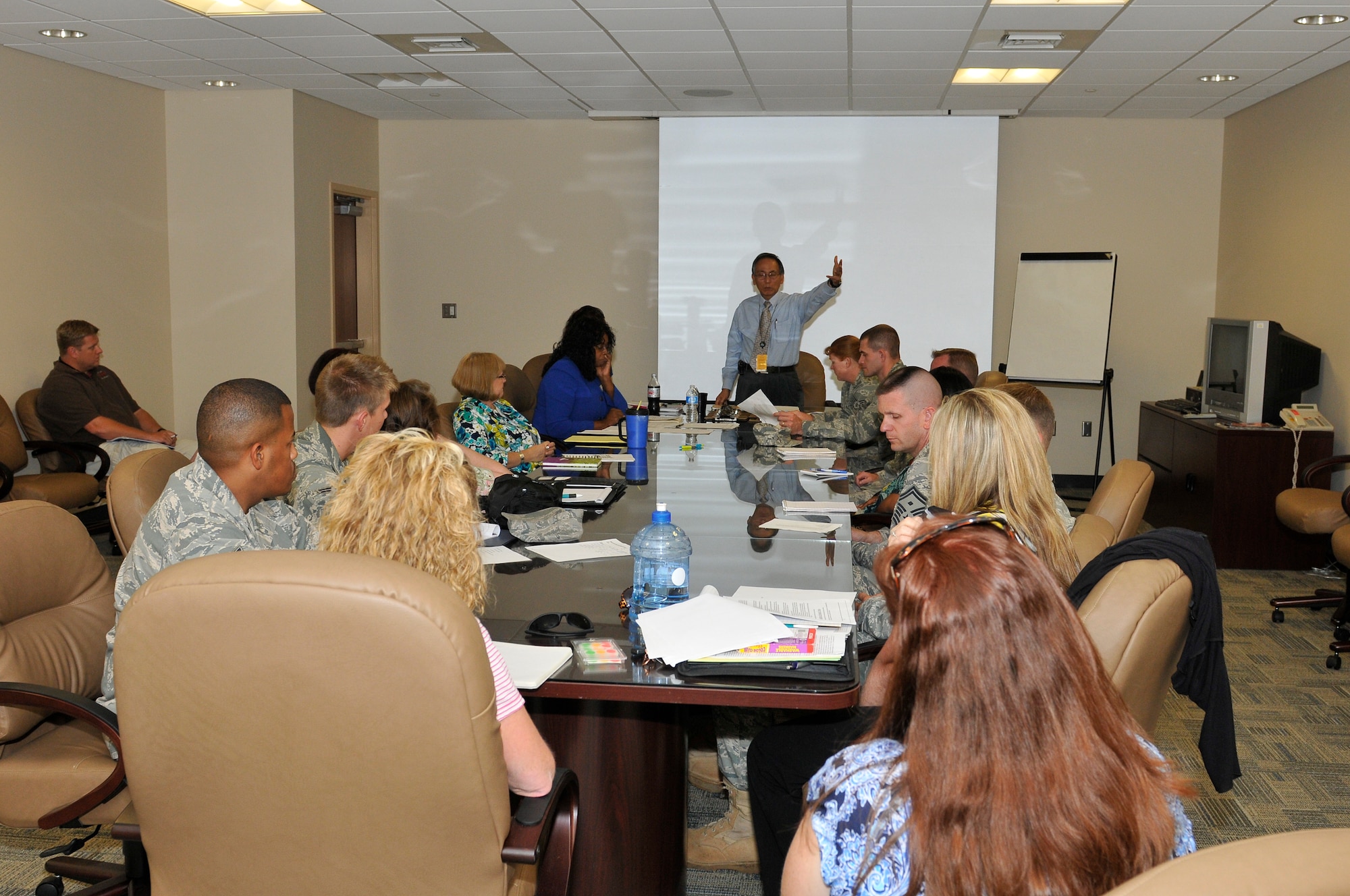 Mr. Alexander Eclar, Health and Wellness Center flight chief and health promotions coordinator, leads discussion during the 2011 Caring for People Forum May 18 and 20. This is the first Caring for People Forum held at Tyndall. Issues discussed here will be taken to Air Education and Training Command. (U.S. Air Force photo by Lisa Norman)