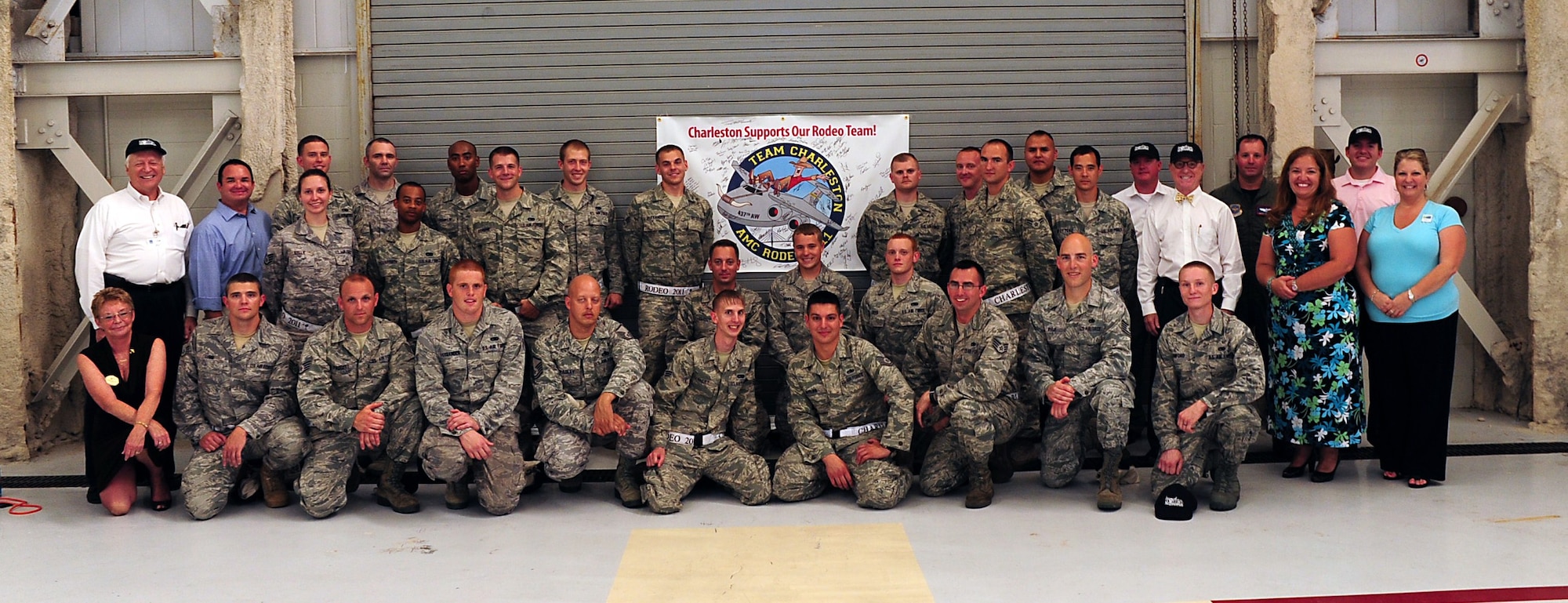 Members of the 437th Airlift Wing 2011 Air Mobility Command Rodeo team, pose
with Joint Base Charleston Honorary Commanders and Advisory Council members
during a team announcement ceremony here, May 24. The Rodeo focuses on
improving the worldwide air mobility forces' professional core abilities by
challenging Airmen on their daily duties, physical capabilities, mental
strength and camaraderie. The civic leaders will attend to provide support
for the team.
