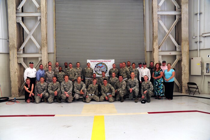 Members of the 437th Airlift Wing 2011 Air Mobility Command Rodeo team, pose
with Joint Base Charleston Honorary Commanders and Advisory Council members
during a team announcement ceremony here, May 24. The Rodeo focuses on
improving the worldwide air mobility forces' professional core abilities by
challenging Airmen on their daily duties, physical capabilities, mental
strength and camaraderie. The civic leaders will attend to provide support
for the team.
