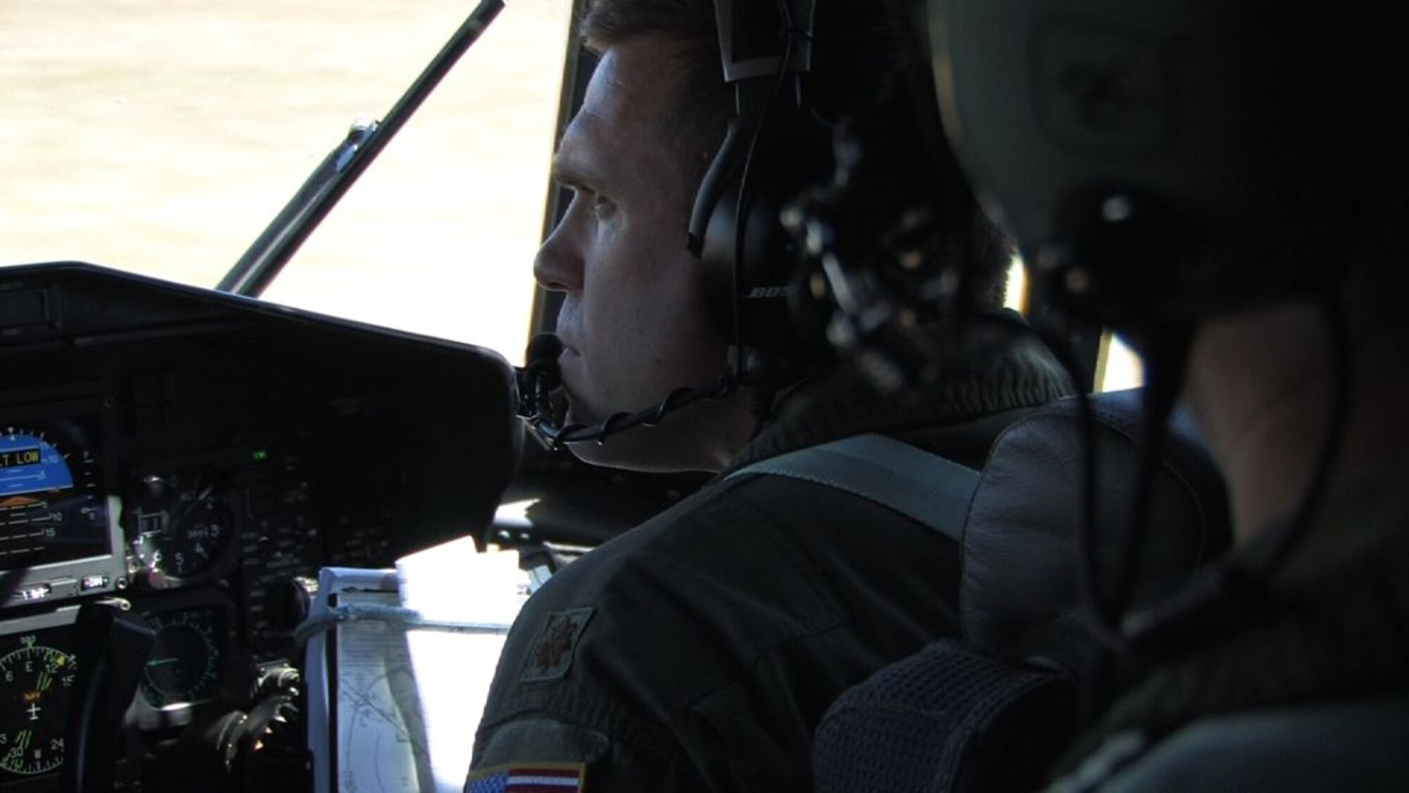 Maj. Marty Schulting, 96th Airlift Squadron C-130 co-pilot, practices landings on a dirt runway at Fort Ripley, Minn. (Air Force photo/Wendy Cormier)