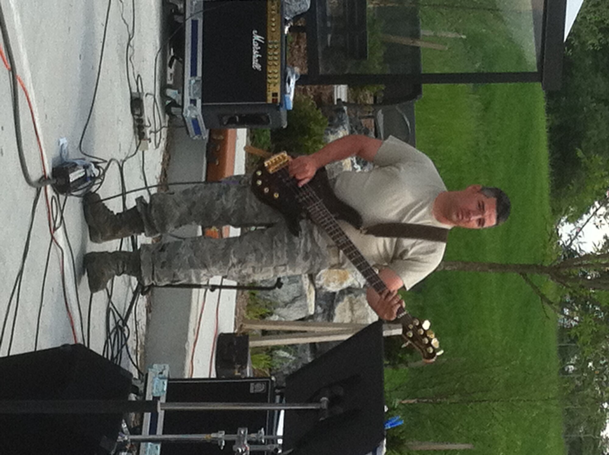 High Altitude performed on May 21, 2011 at Fort Indiantown Gap, Annville, PA. Pictured is bass guitar Tech. Sgt. Jeremy Buss. (Photo by Air Force Staff Sgt. Shawn Estes)