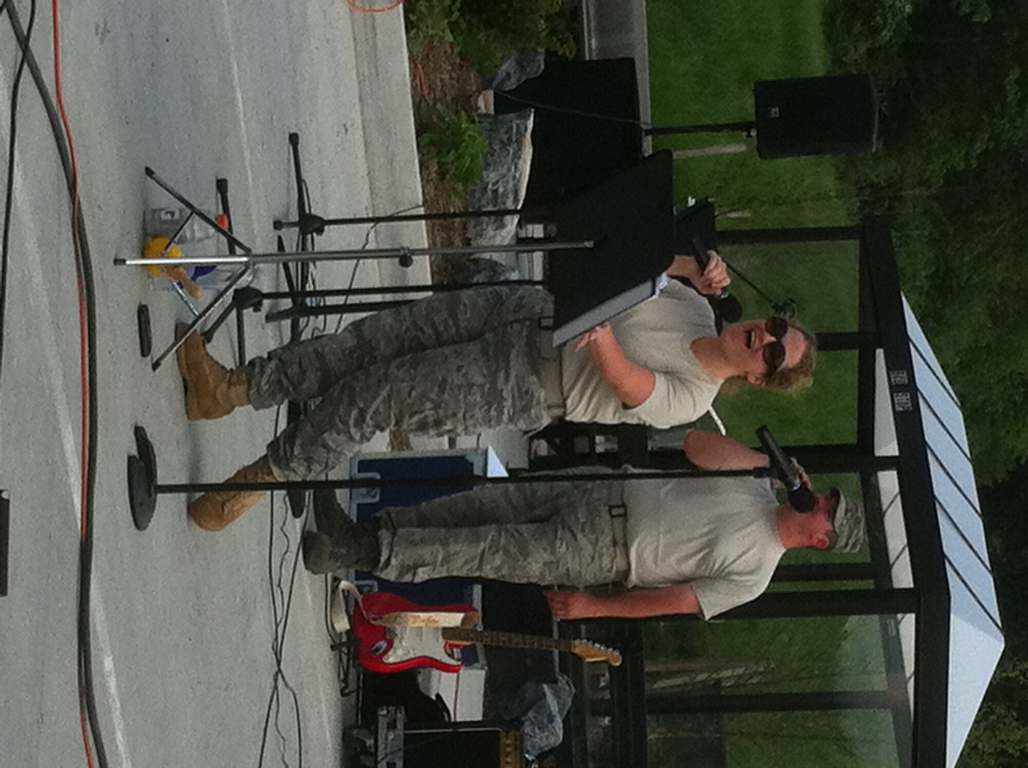 High Altitude performed on May 21, 2011 at Fort Indiantown Gap, Annville, PA. Pictured are vocalist Tech. Sgt. Lori McCarty and guitar/vocalist Staff Sgt. Matthew Carlton. (Photo by Air Force Staff Sgt. Shawn Estes)