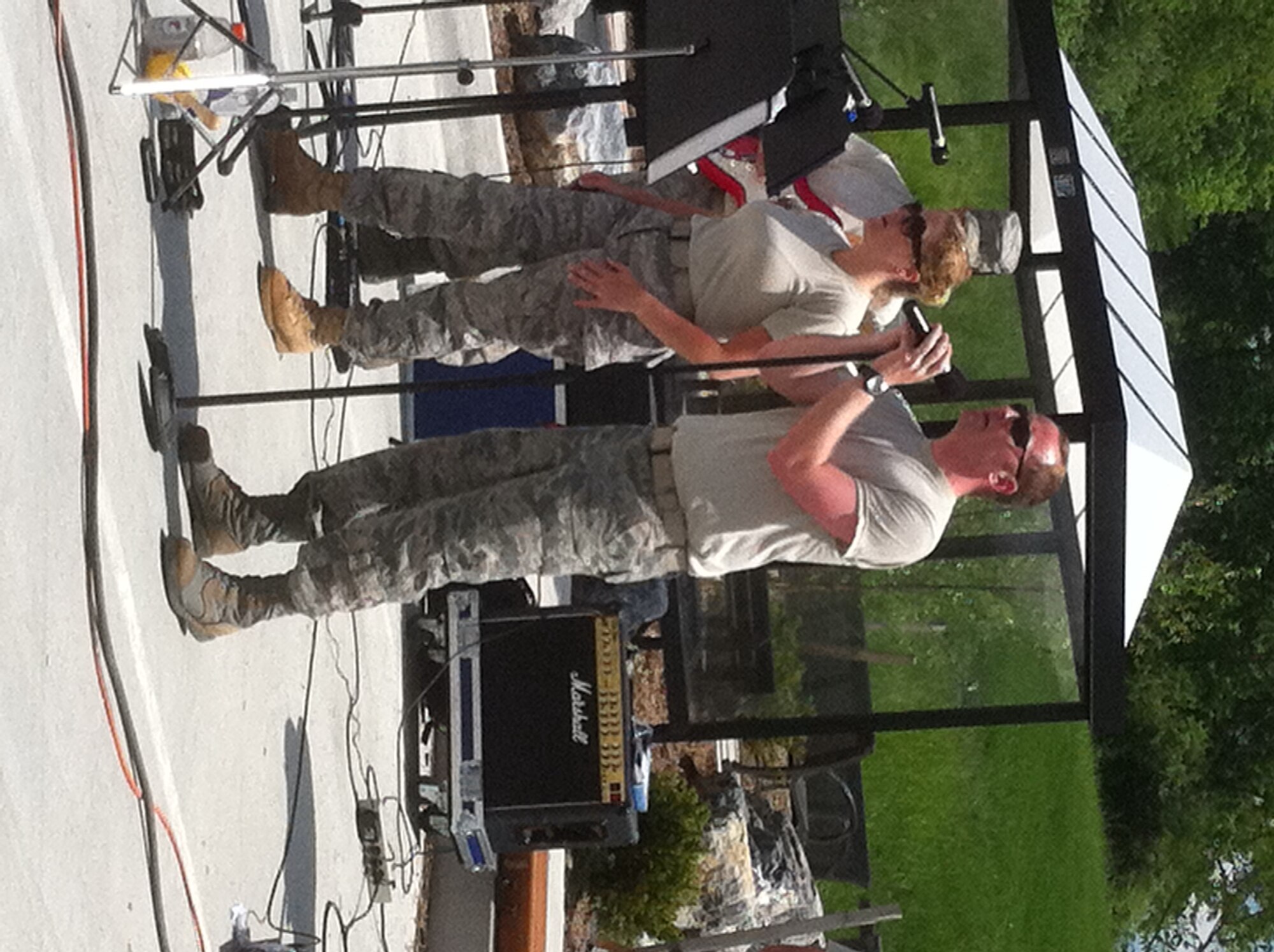 High Altitude performed on May 21, 2011 at Fort Indiantown Gap, Annville, PA. Pictured are vocalists Tech. Sgt. Lori McCarty and SrA Clayton Lee. (Photo by Air Force Staff Sgt. Shawn Estes)