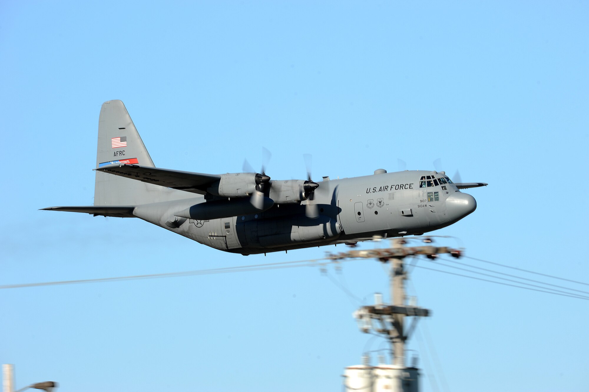 An Air Force Reserve aircrew flying a C-130 Hercules assigned to the 910th Airlift Wing, Youngstown Air Reserve Station, Ohio, performs a mosquito control aerial spray mission over Grand Forks Air Force Base. The spray team, which uses a specially-modified C-130H aircraft and Modular Aerial Spray Systems, make low passes around the spray areas at an altitude of 100-150 feet. They disperse pesticides which target areas of standing water where mosquito larvae breed. The purpose of the mission is to lower the number of irritations and infections associated with mosquito bites, as well as minimize the threat of West Nile Virus.  This is the first scheduled spray of three here for 2011. (U.S. Air Force photo by Tech. Sgt. Johnny Saldivar)


