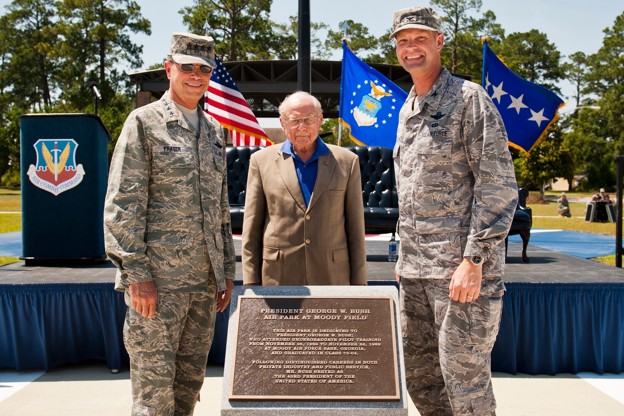 MOODY AIR FORCE BASE, Ga. -- Commander of Air Combat Command Gen. William M. Fraser III, retired Air Force Col. Clarence Parker and 23rd Wing Commander Col. Gary Henderson unveil a monument dedicating the President George W. Bush Air Park at Moody Field during a dedication ceremony May 20. President Bush attended undergraduate pilot training here from November 1968 to November 1969. (U.S. Air Force photo/Staff Sgt. Jamal D. Sutter)(RELEASED) 
