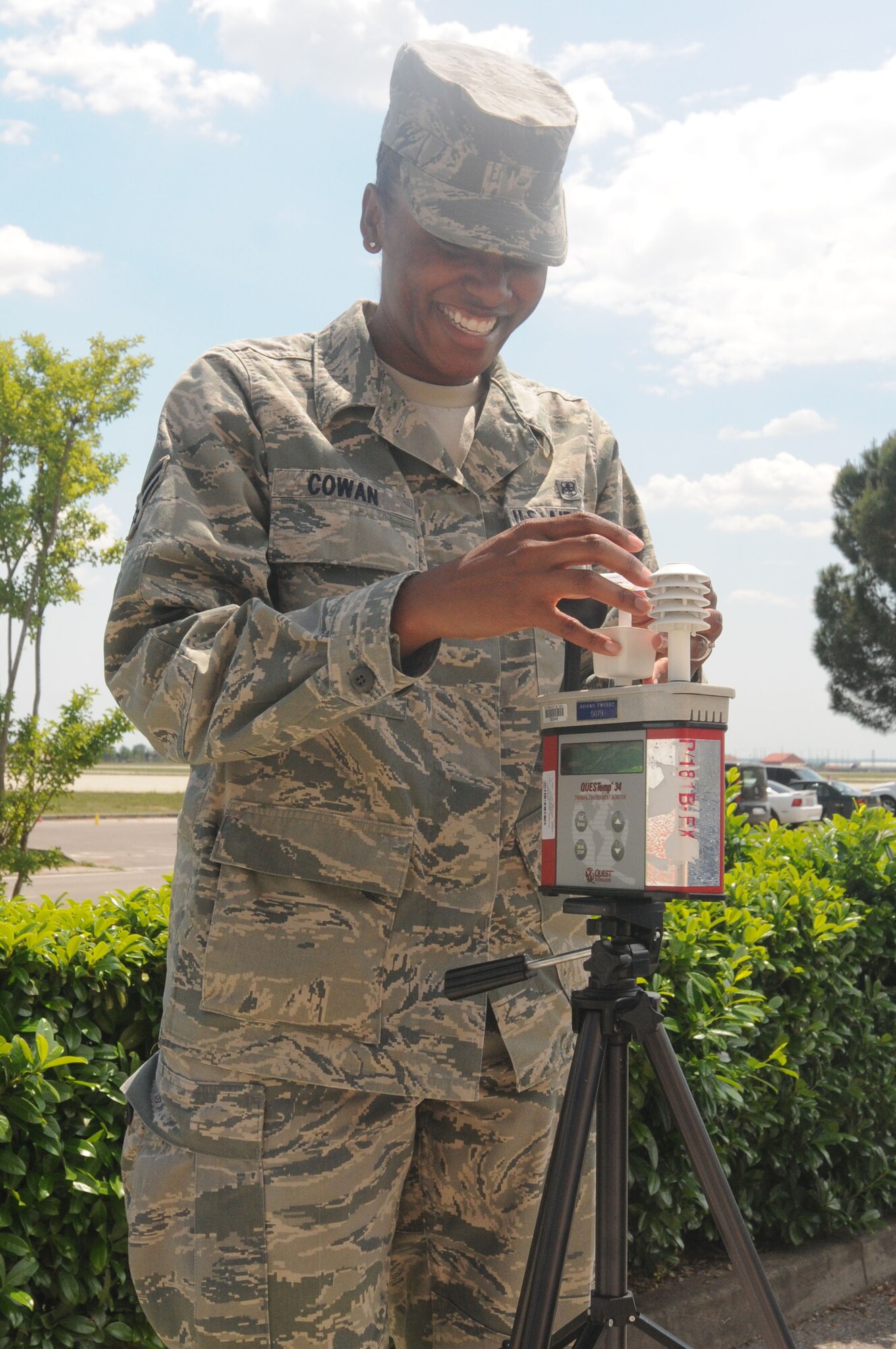 Airman 1st Class Tiffany Cowan, 31st Aerospace Medical Squadron bioenvironmental technician, monitors thermal heat stress using the wet bulb globe temperature May 23 at the flight medicine clinic. Airman Cowan recently received the 2010 National Association for the Advancement of Colored People Roy Wilkins Renown Service award for U.S. Air Forces in Europe. This award honors Department of Defense personnel who supported overseas contingency operations and demonstrated role model qualities and the core values of their respective military service.(U.S. Air Force photo/Airman LaVel Sterling)