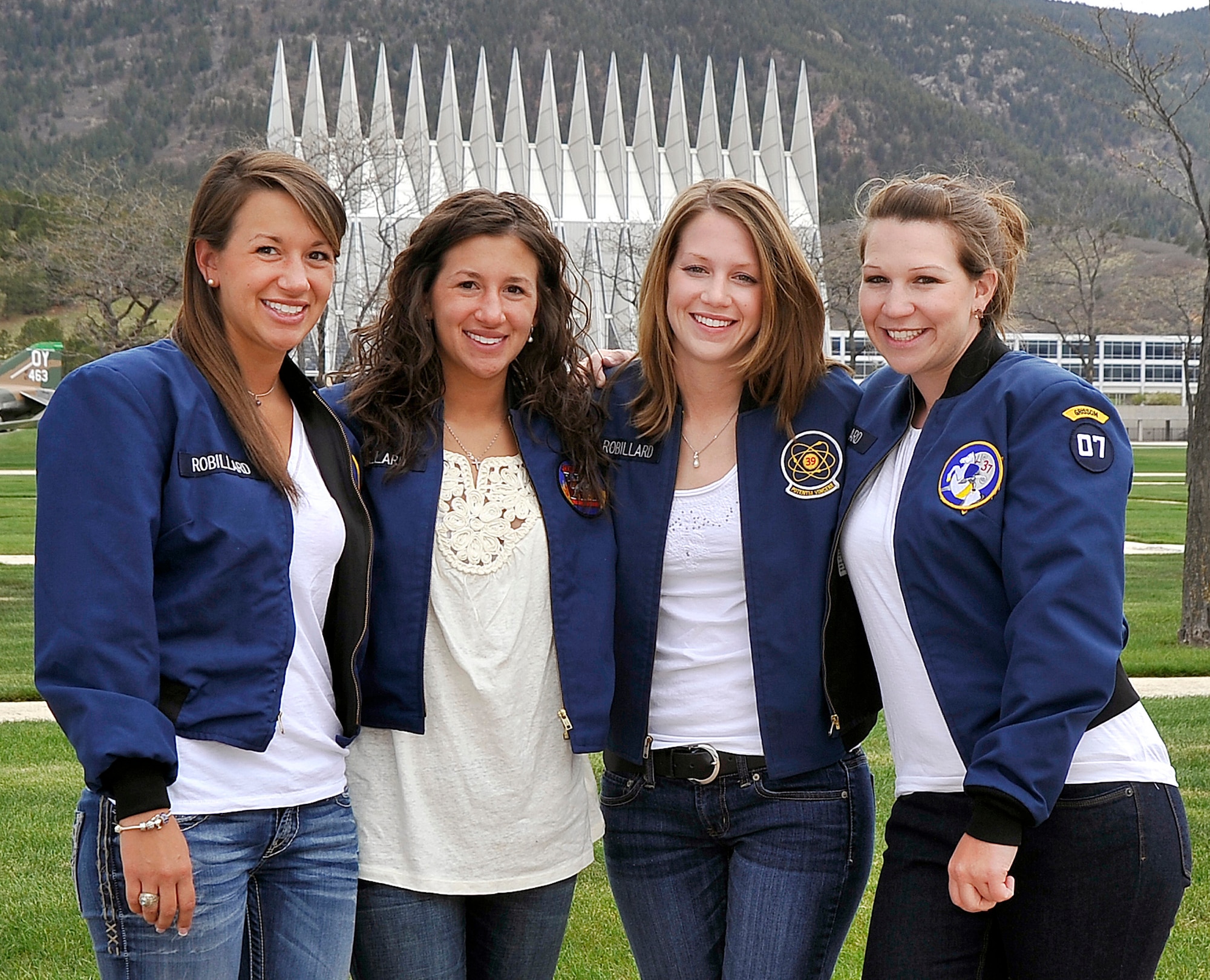 The Robillard sisters stand together on the Terrazzo at the Air Force Academy May 23, 2011. They are, from left: Amanda and Alicia, Class of 2011; Nicole, Class of 2009; and Lauren, Class of 2007. The family made Academy history May 25 as the first to have four sisters graduate from the institution. (U.S. Air Force photo/Megan Davis)