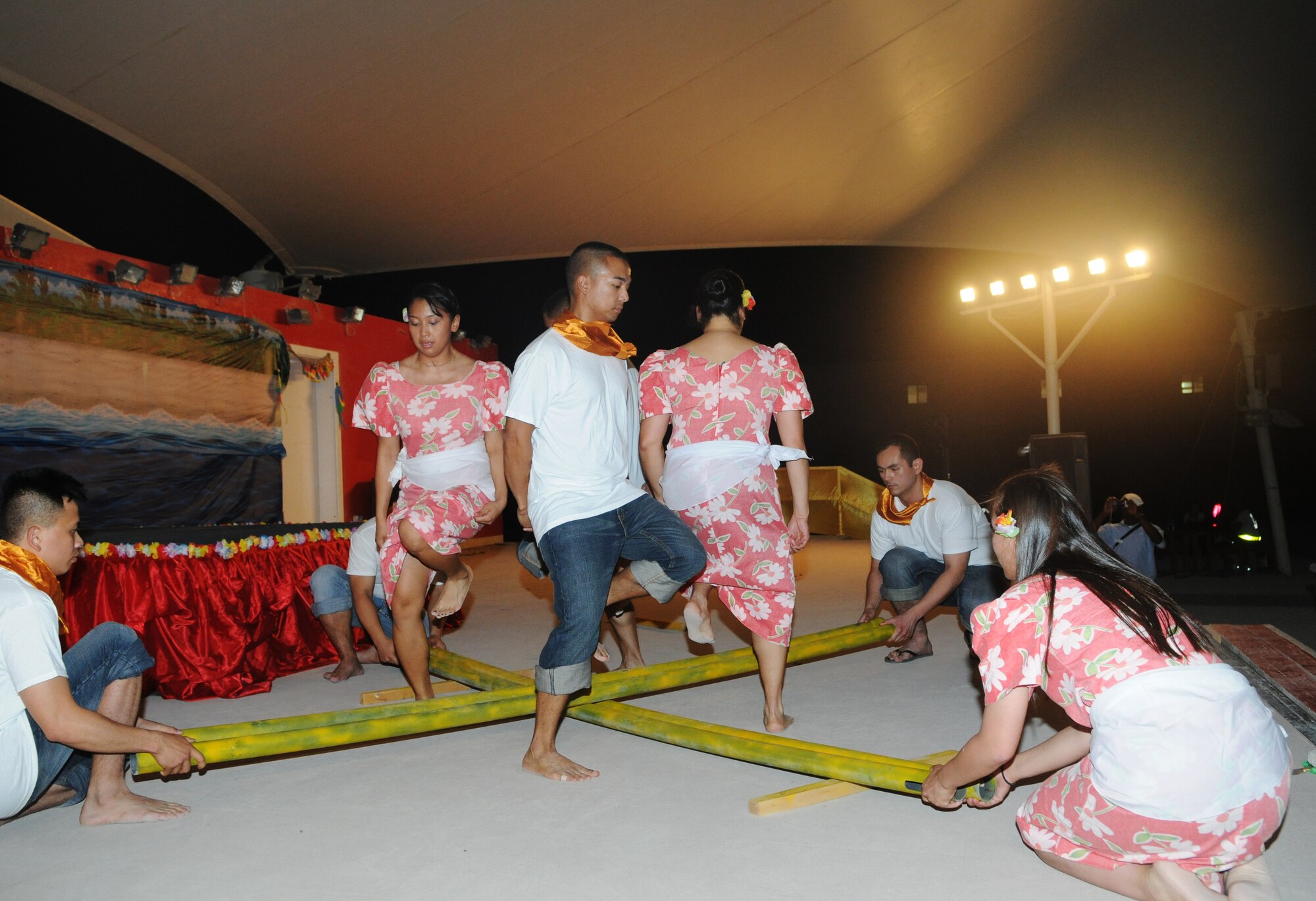 Members of the Asian Pacific American Association from the 379th Air Expeditionary Wing perform May 21 in Southwest Asia. (U.S. Air Force photo/ Staff Sgt. Anthony Graham)