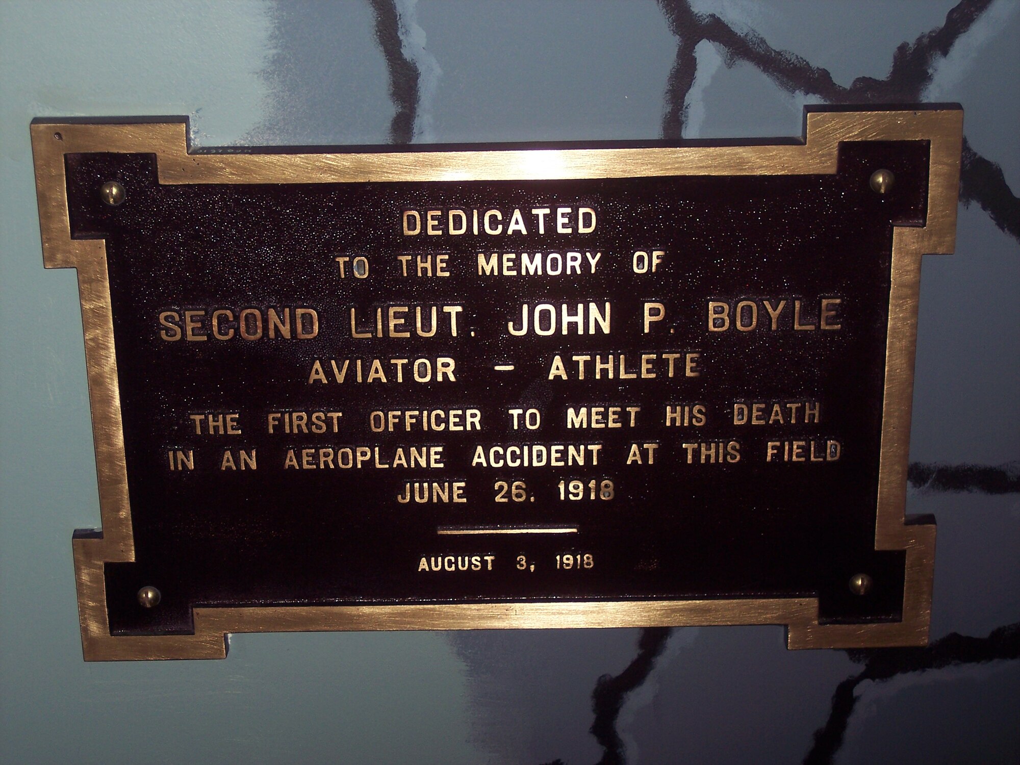 Photo of plaque honoring John Patton Boyle, the first pilot to die in an aircraft crash at Selfridge Field, Mich. The plaque is now on display at the Selfridge Military Air Museum at Selfridge Air National Guard Base. A street on the base is also named in his honor. (U.S. Air Force photo).