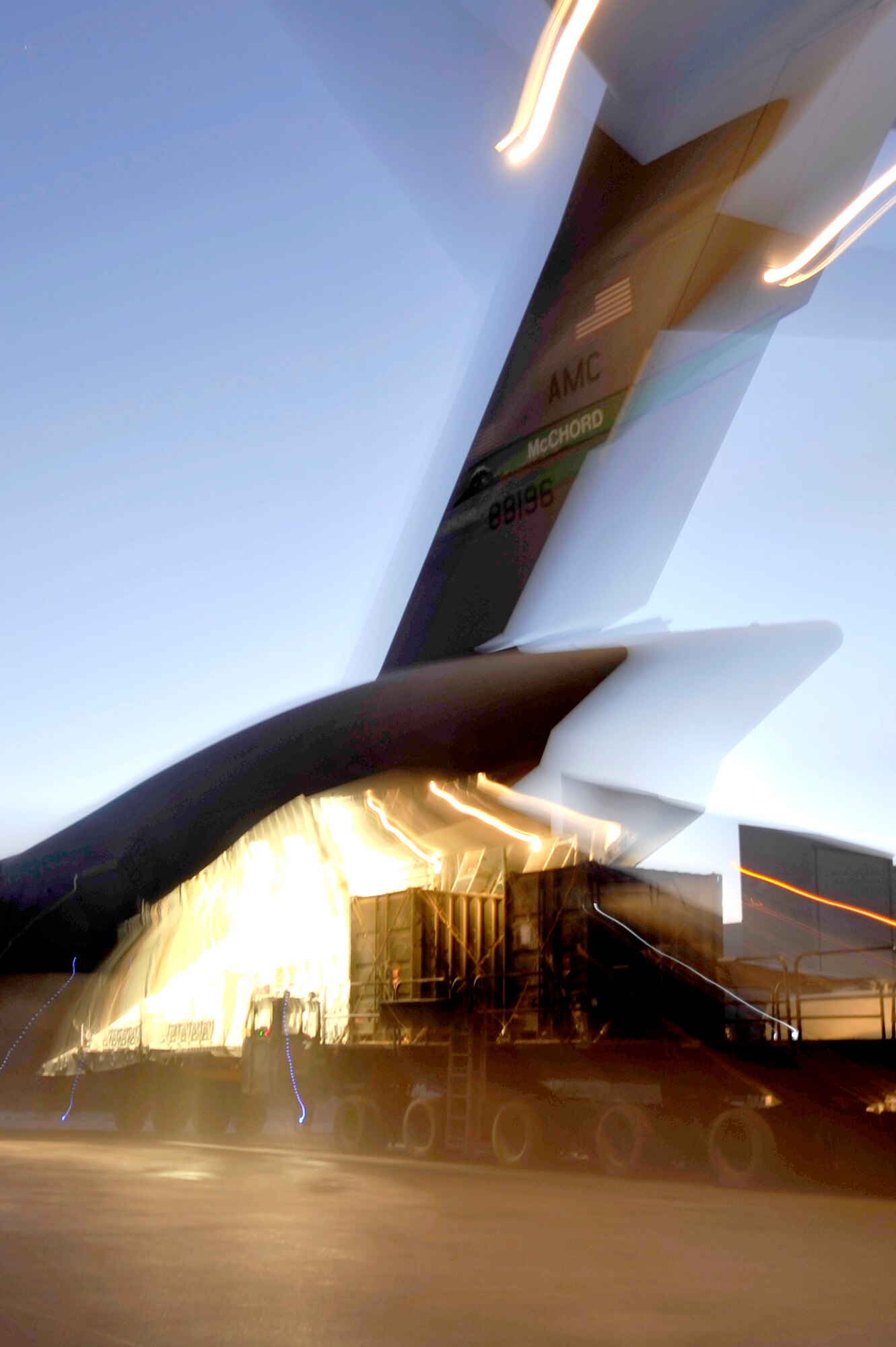 Cargo is loaded onto a C-17 Globemaster III assigned to the 385th Air Expeditionary Group at Kandahar Airfield, Afghanistan, for a flight to Mihail Kogalniceanu Air Base, Romania, May 20.  Several C-17s are temporarily deployed to MK from another base in the region that is closed for routine runway repairs.  (U.S. Air Force photo by Master Sgt. Laura K. Deckman/released)

