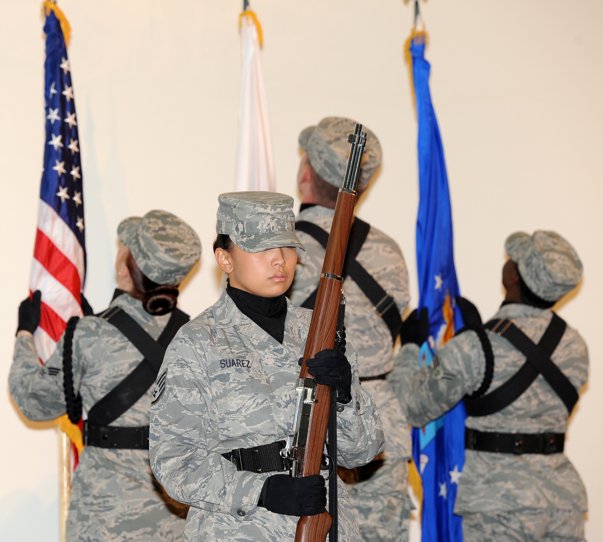 Members of the base Honor Guard post the colors during a change of command ceremony May 25. Col. James Pease assumed command of the 379th Expeditionary Mission Support Group from Col. Korvin Auch. The 379 EMSG provides expeditionary combat support -- to include maintaining and sustaining base infrastructure valued at more than $2 billion, and security for more than $10 billion in critical assets. (U.S. Air Force photo/Staff Sgt. Liliana Moreno)      