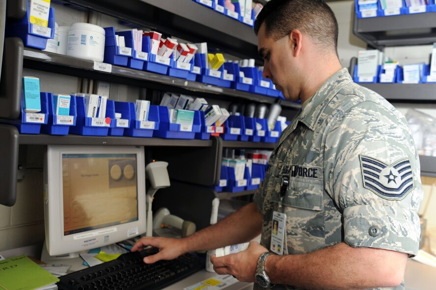 KUNSAN AIR BASE, Republic of Korea -- Tech. Sgt. Paul Barnett, 8th Medical Support Squadron diagnostic therapeutic flight chief, fills a prescription here May 24. The 8th MDSS fills approximately 1,100 prescriptions a month. (U.S. Air Force photo/Senior Airman Brittany Y. Bateman) 