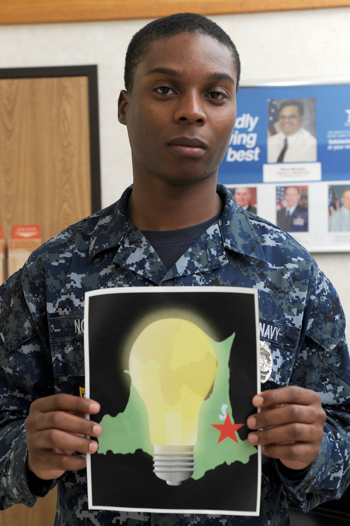 MISAWA AIR BASE, Japan -- U.S. Navy Seaman Apprentice Sean Noel, Naval Air Facility security patrolman, says "I don't use indoor lights, I unplug everything I don't use and when I open the fridge I don't keep it open very long, I just take what I need, then close it." (U.S. Air Force photo/Staff Sgt. Marie Brown/Released)