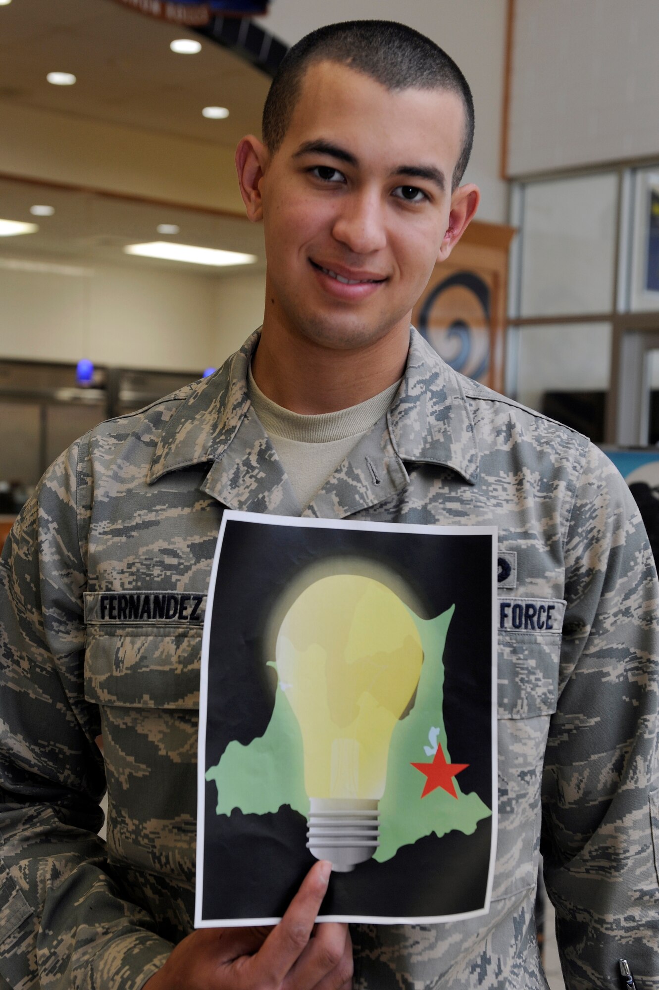 MISAWA AIR BASE, Japan -- Airman Basic Jean Carlos Fernandez, 35th Security Forces Squadron journeyman, says "I turn off all my power before I leave and ride my bike everywhere I go." (U.S. Air Force photo/Staff Sgt. Marie Brown/Released)
