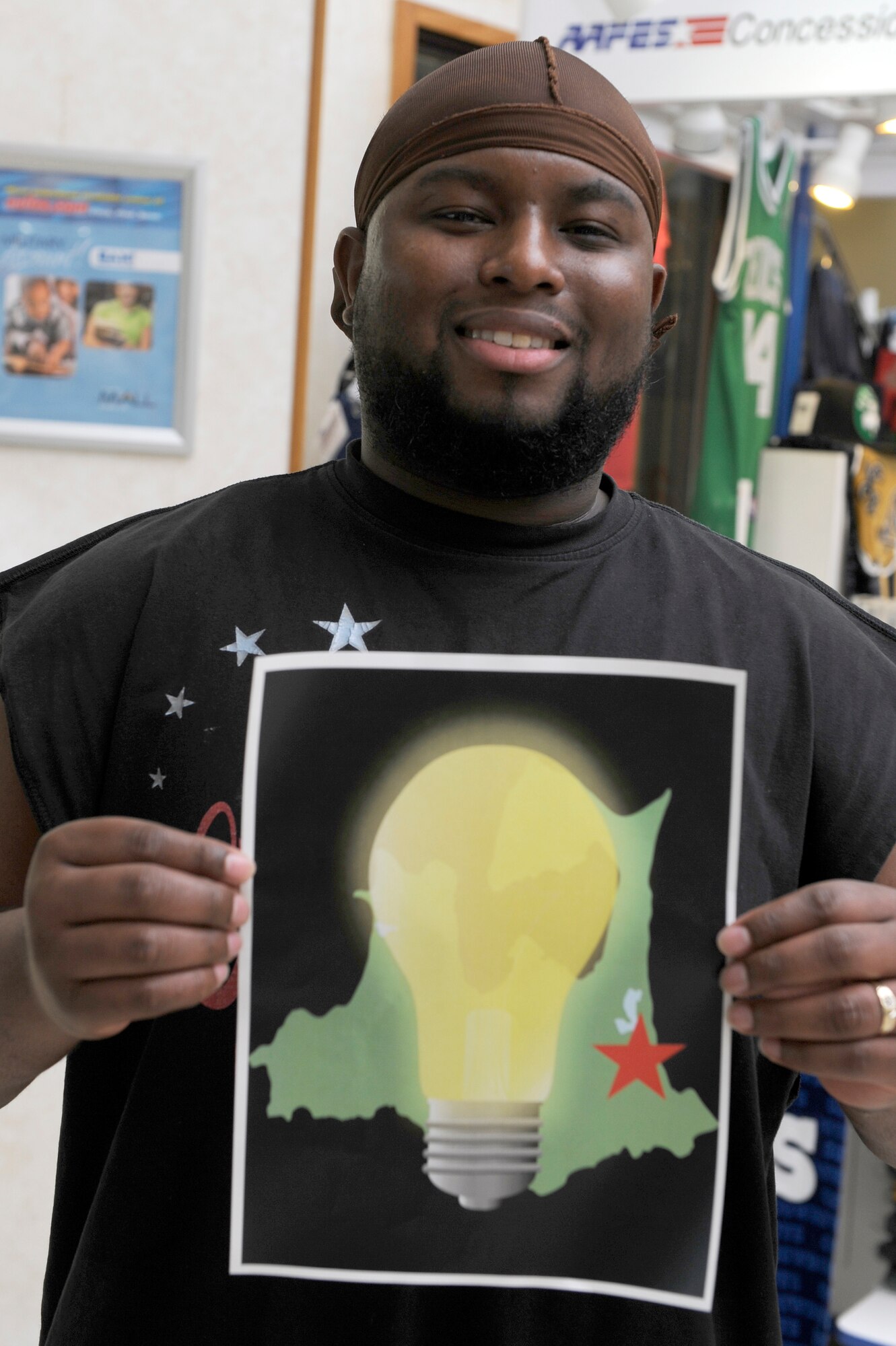 MISAWA AIR BASE, Japan -- Jermaine Henderson, Navy spouse, says "I ensure my family turns off lights as they exit the room and as well as using the washer and dryer at certain times of the day." (U.S. Air Force photo/Staff Sgt. Marie Brown/Released)