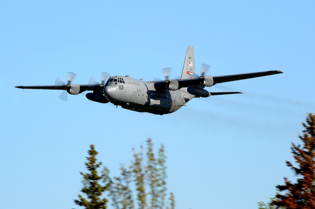 An Air Force Reserve aircrew flying a C-130 Hercules assigned to the 910th Airlift Wing, Youngstown Air Reserve Station, Ohio, performs a mosquito control aerial spray mission over Grand Forks Air Force Base. The spray team, which uses a specially-modified C-130H aircraft and Modular Aerial Spray Systems, make low passes around the spray areas at an altitude of 100-150 feet. They disperse pesticides which target areas of standing water where mosquito larvae breed. The purpose of the mission is to lower the number of irritations and infections associated with mosquito bites, as well as minimize the threat of West Nile Virus.  This is the first scheduled spray of three here for 2011. (U.S. Air Force photo by Tech. Sgt. Johnny Saldivar)

