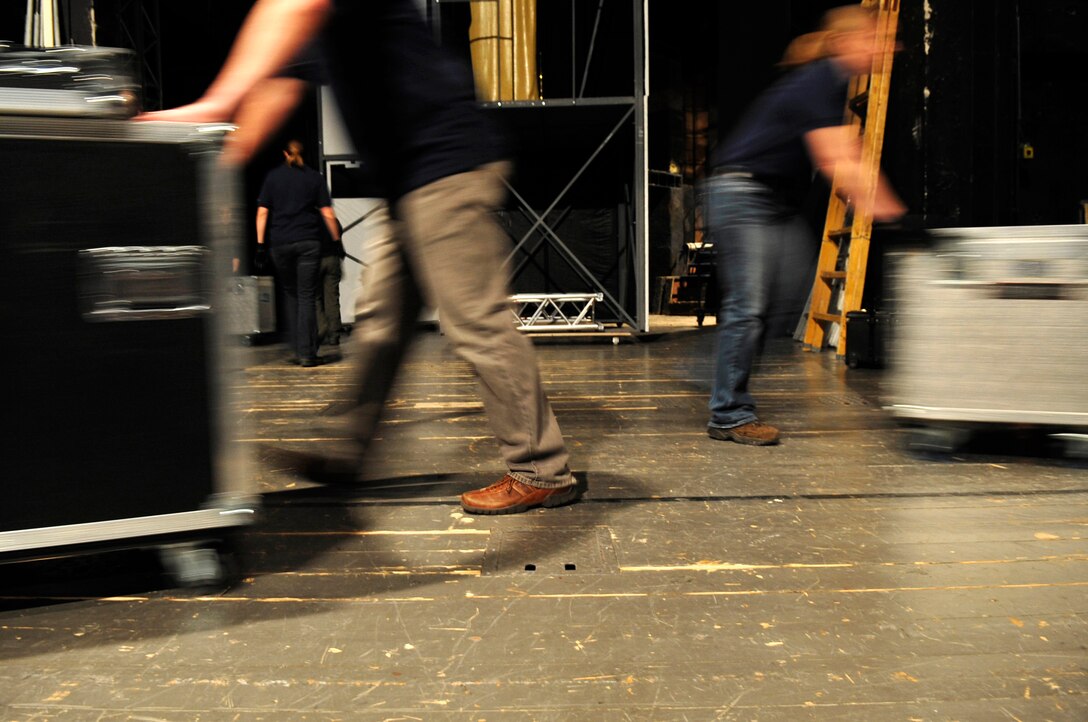 Members of the United States Air Forces in Europe Band set up the stage before a performance May 4, 2011, in Bratislava, Slovakia.  The USAFE concert band is on tour through three countries, performing at seven locations as part of a building partnerships capacity and community outreach initiative. (U.S. Air Force photo/Tech. Sgt. Jocelyn L. Rich)