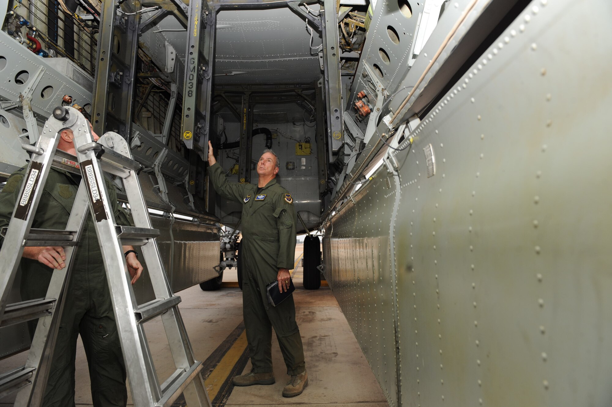 Maj. Gen. Floyd Carpenter, 8th Air Force commander, performs his last pre-flight inspects for a B-52H Stratofortress on Barksdale Air Force Base, La., May 24. General Carpenter is retiring after 33 years of service and 3,000 flight hours in the B-52. (U.S. Air Force photo/Airman 1st Class Micaiah Anthony) (RELEASED)
