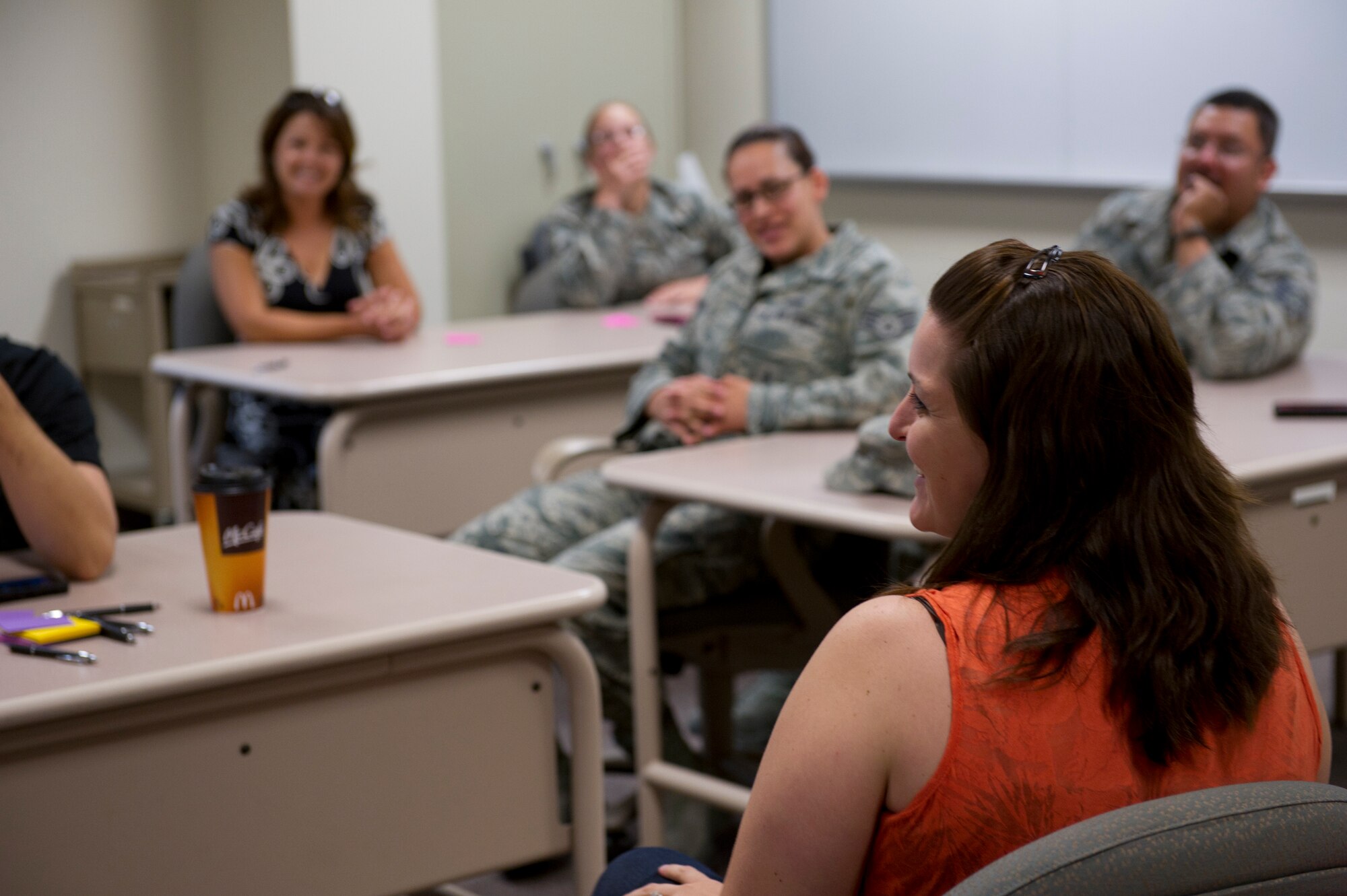 HOLLOMAN AIR FORC BASE, N.M. -- Members of a deployment support working group discuss issues and concerns surrounding deployments, May 24, 2011, during Holloman’s Caring for People Forum. The forums covered ways to increase or improve services such as teen support, deployment support, family support, single Airmen support, special needs support, health and wellness, spouse communications and Reserve support. (U.S. Air Force photo by Senior Airman Veronica Stamps/Released)