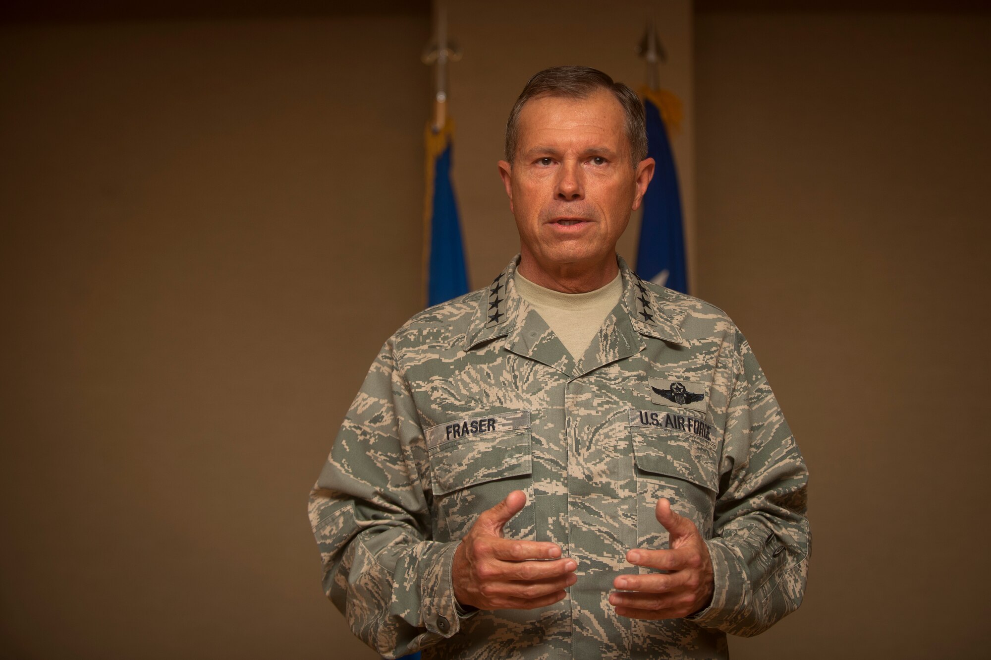 MOODY AIR FORCE BASE, Ga.-- Gen. William M. Fraser III, commander of Air Combat Command, speaks to Airmen, family and friends about the heroism displayed by members of the 41st Rescue Squadron during an award ceremony May 20. The Airmen from the 41st RQS were involved in a night mission in Afghanistan to rescue a british casualty whose injury put the lives of 160 British soldiers in jeopardy. (U.S. Air Force photo/Airman 1st Class Joshua Green)(RELEASED)
