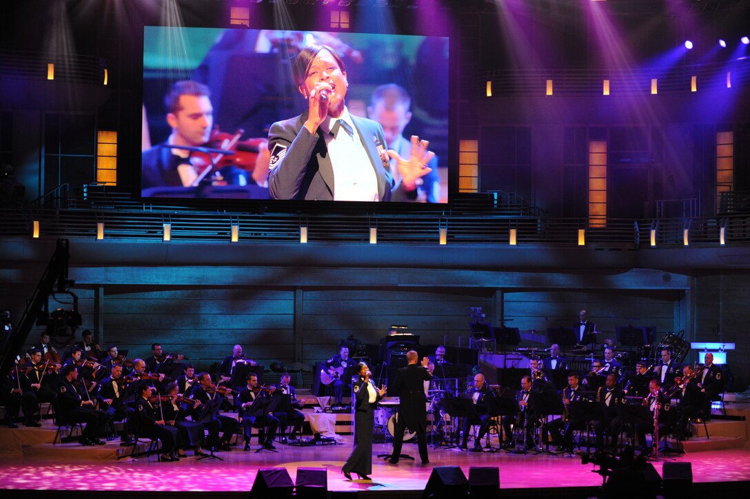 Master Sgt. Shani Prewitt entertained the crowd with the world premier of “Into the Sun,” composed by the Band's own Master Sgt. Matt Ascione.  (AF Photo by SrA Christopher Ruano)