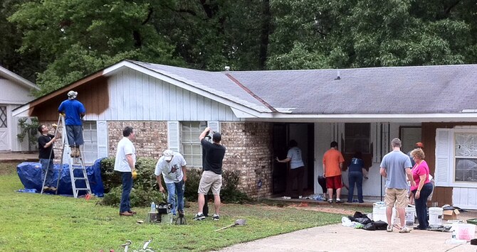 SHREVEPORT, La. – Members of the Eighth Air Force A4/7 help provide a facelift to a house in Shreveport during the “Paint Your Heart Out Shreveport” project May 21. The project helped fix up more than 50 homes in Shreveport. (U.S. Air Force photo by Master Sgt. Lee Meyers)