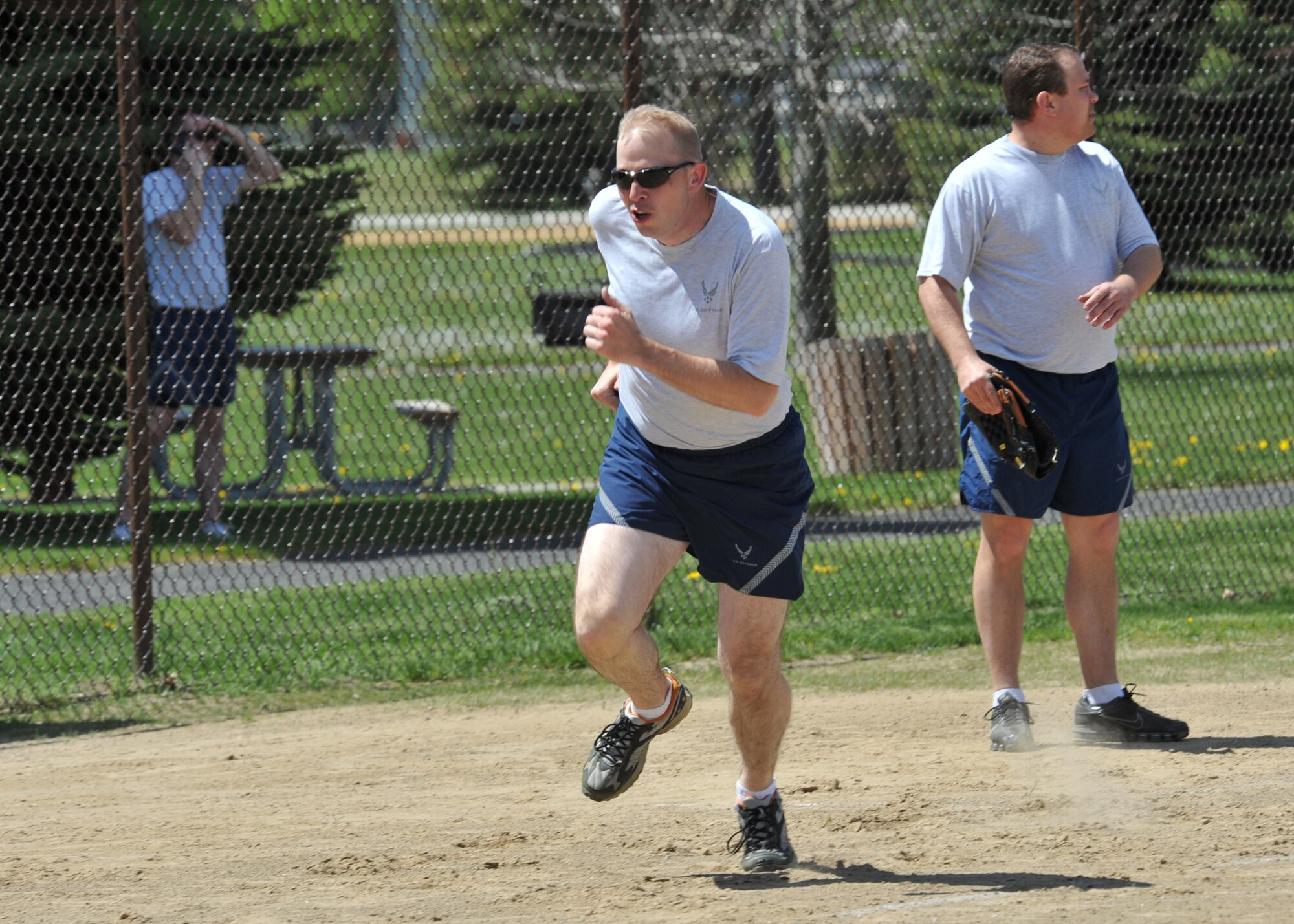 Lt. Col. Brant Folken, 92nd Force Support Squadron commander runs home, May 20, 2011, during the chief’s and first sergeant’s versus commanders at Fairchild Air Force base. The game was part of the Commander’s 101 Critical Days of Summer Challenge. (U.S. Air Force photo by Staff Sgt. Michael Means)