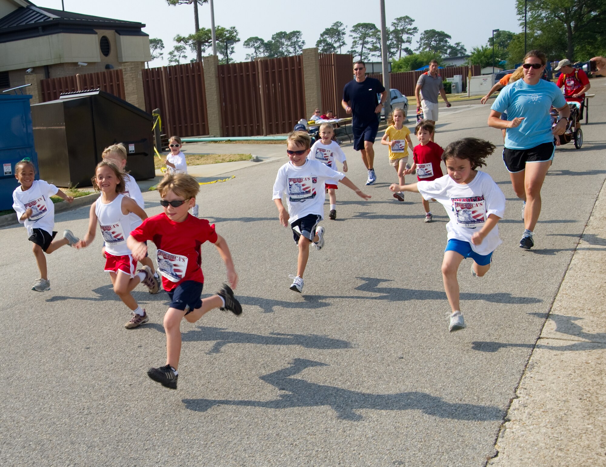 Keesler children celebrated Armed Forces Day Saturday by taking part in the 26th annual America’s Kids Run, the world’s largest children’s running event. The runners joined those from other military bases around the world by running from the youth center down I-81.  (U.S. Air Force photo by Adam Bond)