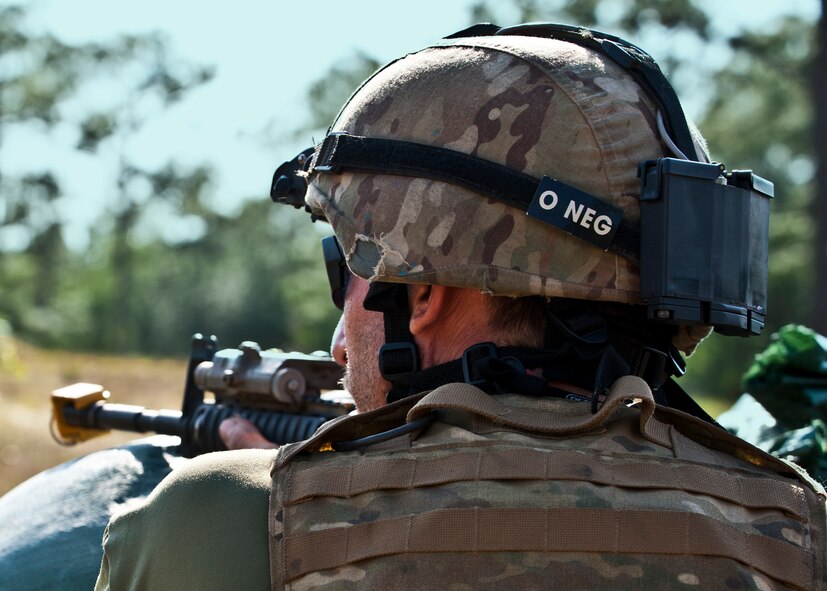 Tech. Sgt. Jason Parker scans downrange during the Combat Aviation Advisor course’s Raven Claw exercise May 24 at Duke Field, Fla.  As part of the exercise, 19 CAA students deployed to a foreign nation to advise and train their air forces in fixed wing and rotary aircraft operations.  The four-day exercise is the capstone of 12 weeks of baseline certification training for CAA.  The year-long process to become a CAA also includes months of language and flight training.  (U.S. Air Force photo/Tech. Sgt. Samuel King Jr.)