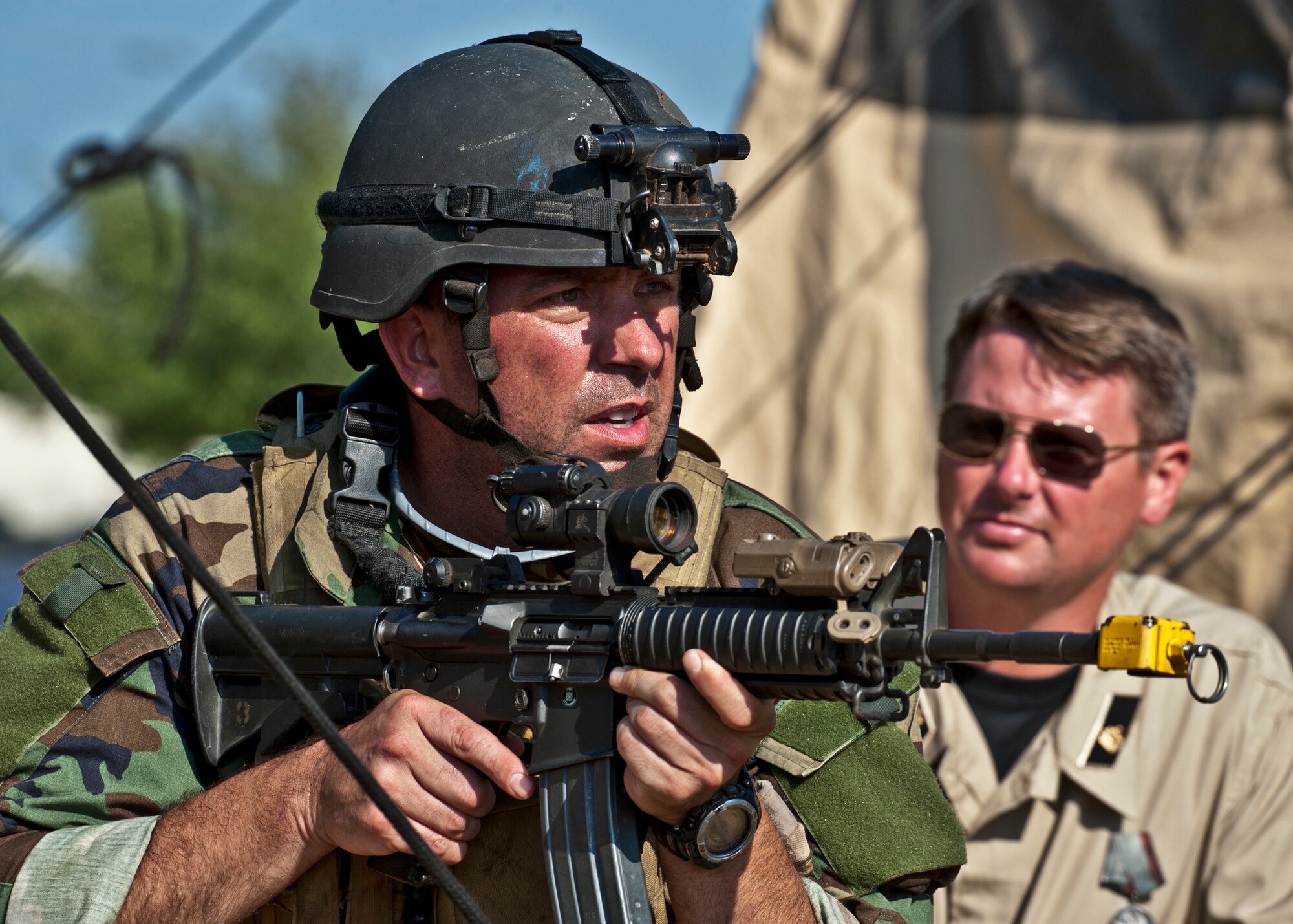 Lt. Col. Rodrigo Vial, 5th Special Operations Squadron, scans the area after his team heard sounds of a firefight west of their camp during the Combat Aviation Advisor course’s Raven Claw exercise May 24 at Duke Field, Fla.  Colonel Vial and four other 5th SOS Airmen completed the course and earned their air commando badges.  They were the first reservists to ever take the course, which prepares Airmen to deploy to partner nations to train personnel to engage in air operations. (U.S. Air Force photo/Tech. Sgt. Samuel King Jr.)