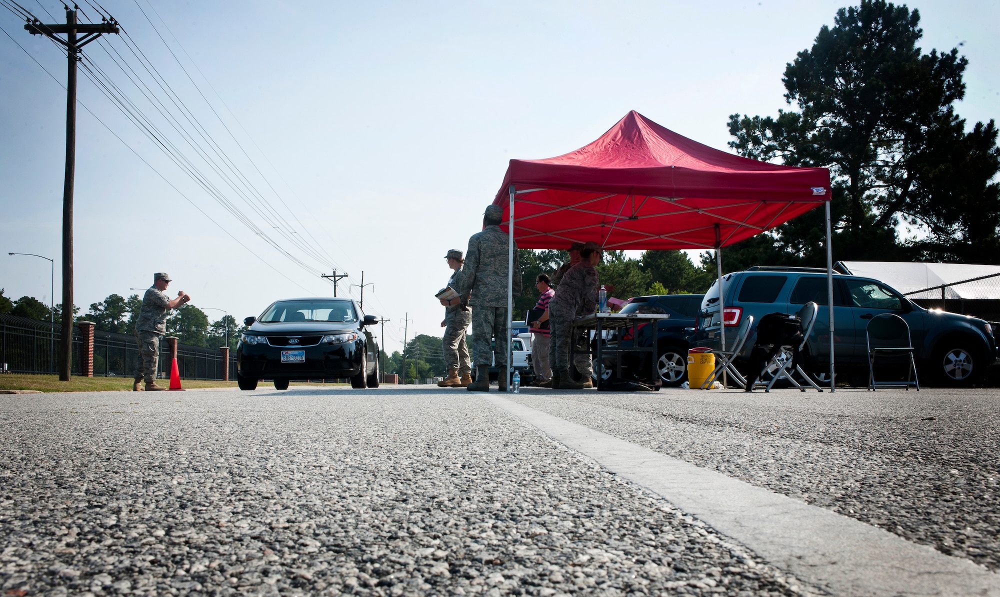 MOODY AIR FORCE BASE, Ga.--The 23rd Medical Group performs a point of distribution exercise outside the Airman’s Attic May 25. For the first time, this annual exercise ran a drive-thru point of distribution. The drive-thru cut down on the spread of a possible contamination during a real event. (U.S. Air Force photo/Airman 1st Class Benjamin Wiseman)(RELEASED)