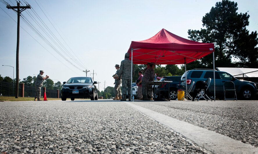 MOODY AIR FORCE BASE, Ga.--The 23rd Medical Group performs a point of distribution exercise outside the Airman’s Attic May 25. For the first time, this annual exercise ran a drive-thru point of distribution. The drive-thru cut down on the spread of a possible contamination during a real event. (U.S. Air Force photo/Airman 1st Class Benjamin Wiseman)(RELEASED)